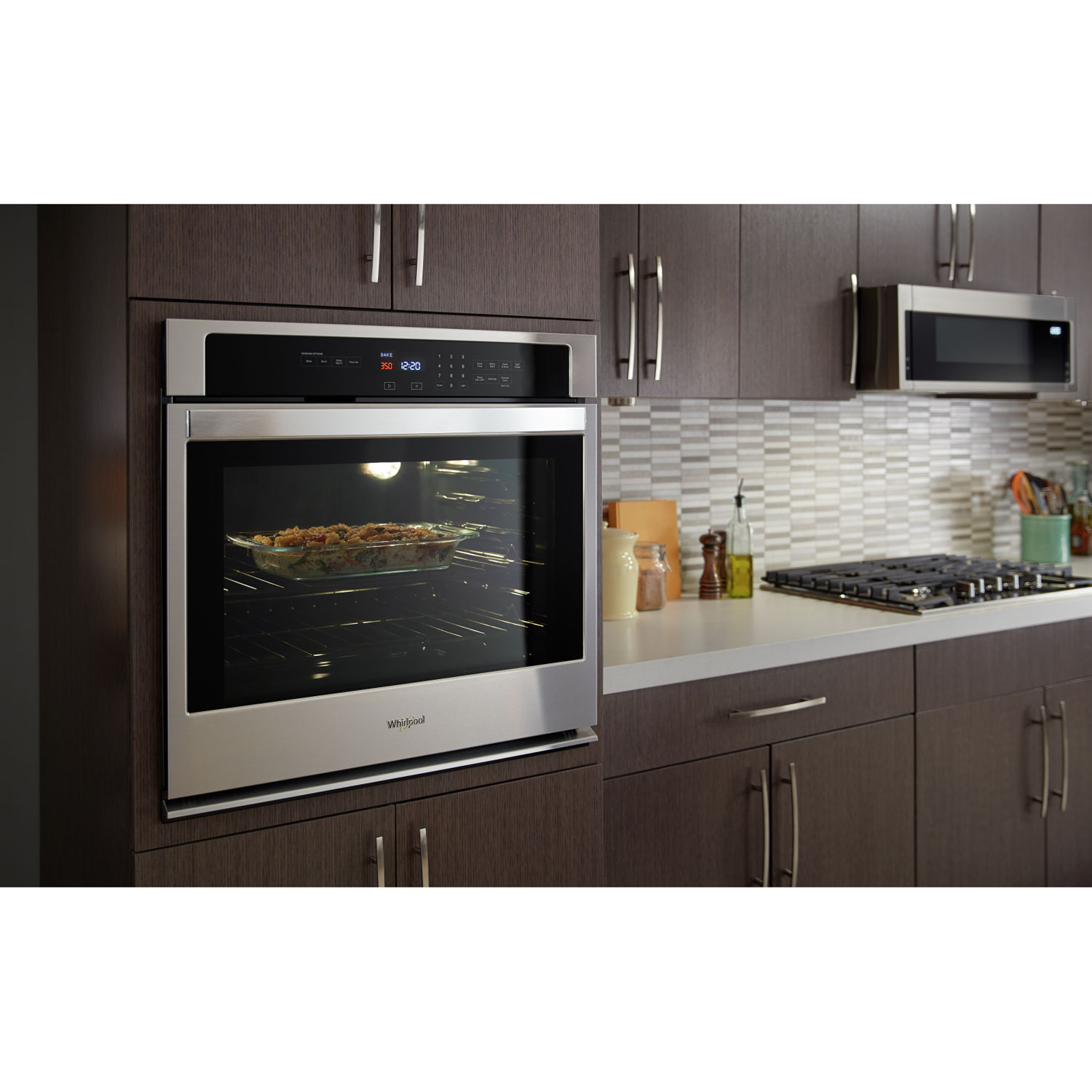 Four à micro-ondes à hotte intégrée de Whirlpool - 1,1 pi³ - Acier inoxydable