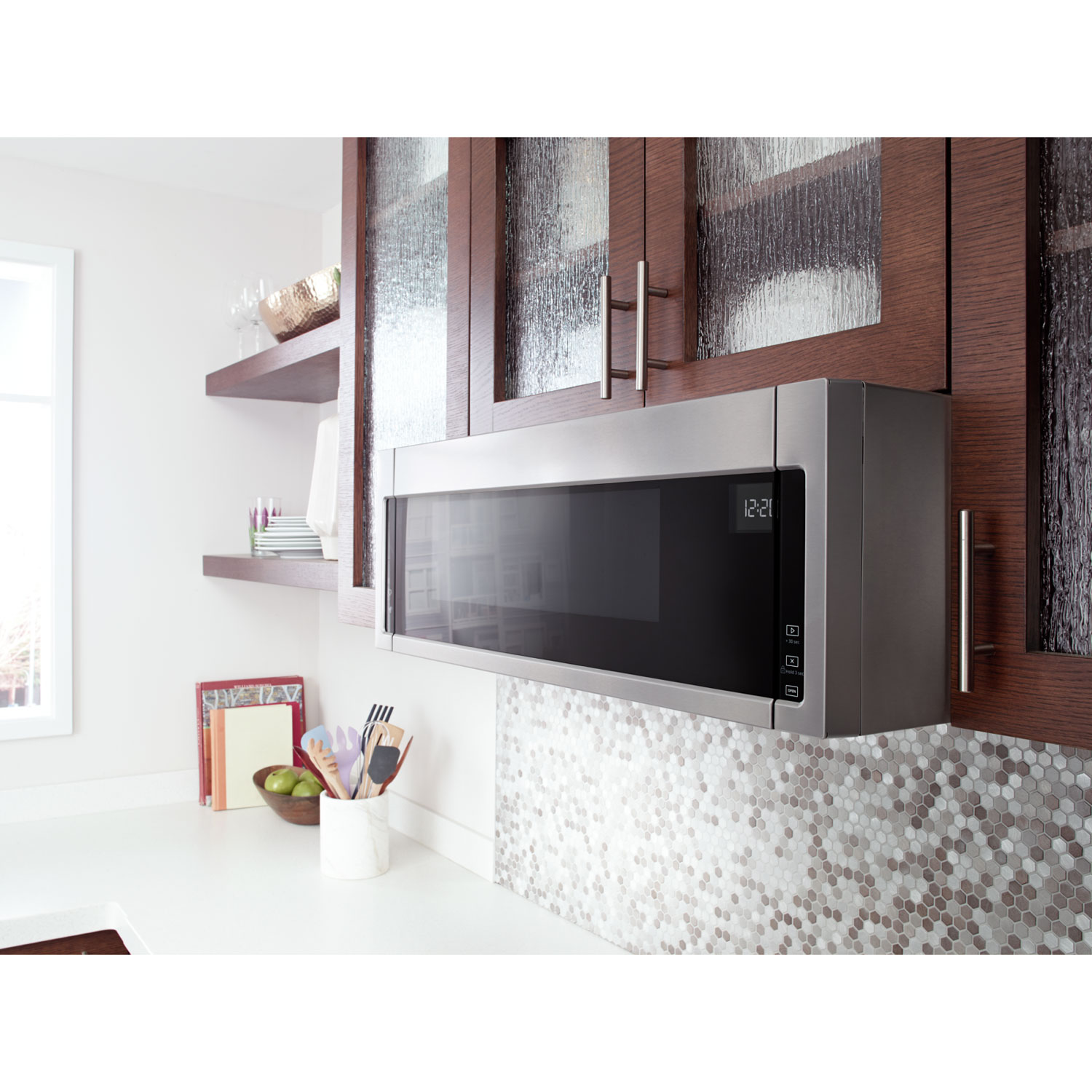 Four à micro-ondes à hotte intégrée de Whirlpool - 1,1 pi³ - Acier inoxydable