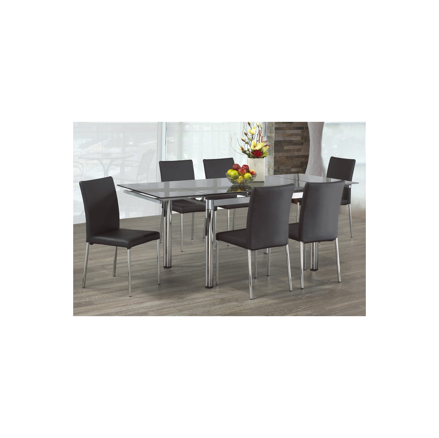 Table extensible moderne en verre transparent avec pattes cylindriques en métal au fini chromé pour 4 à 6 personnes