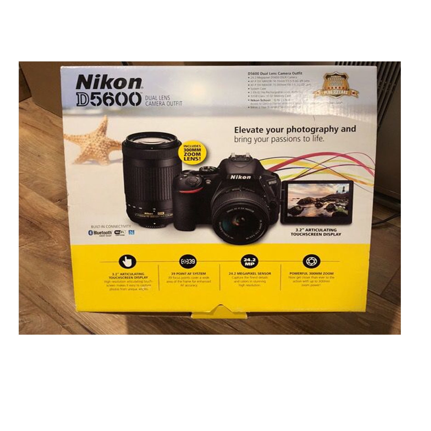 Nikon D5600 DSLR Camera with 18-55mm and 70-300mm Lenses | Sandisk 32GB Memory Card | Nikon Case | Spare Battery Bundle - US Version w/ Seller