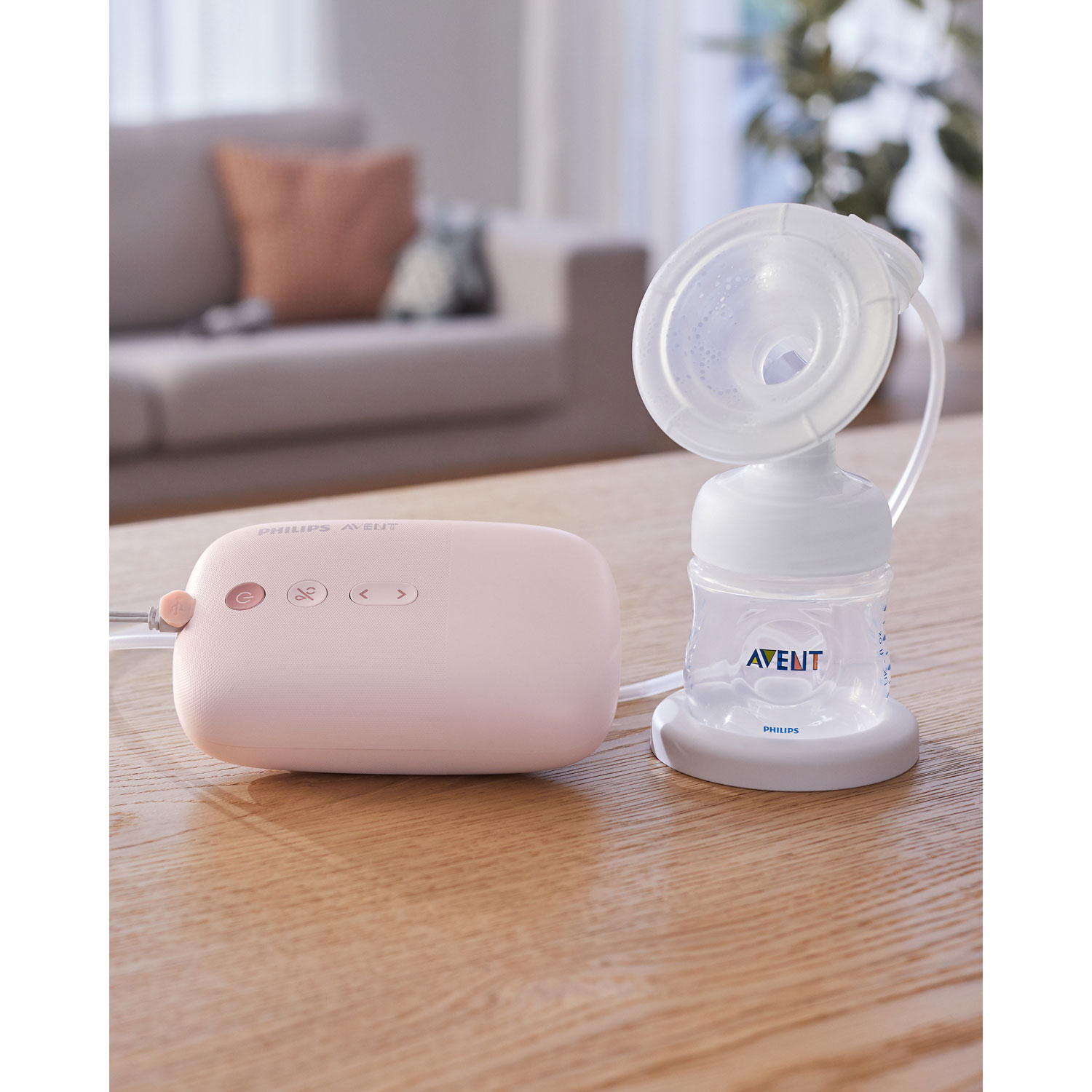 Philips AVENT Single Electric Breast Pump Advanced with Natural Motion  Technology, SCF391/62, Pump Light Pink, Bottle Clear