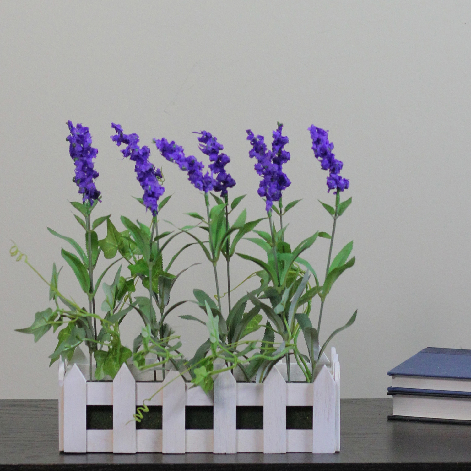11.75" Artificial Flowering Lavender Plant in White Picket Fence Container