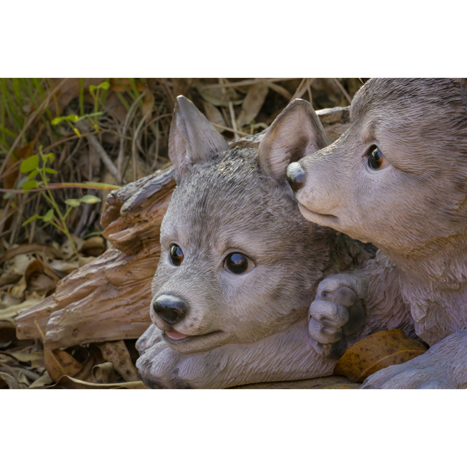 Hi-Line Gift Ltd Grey Wolf Cubs Hiding Under Log Garden Statue