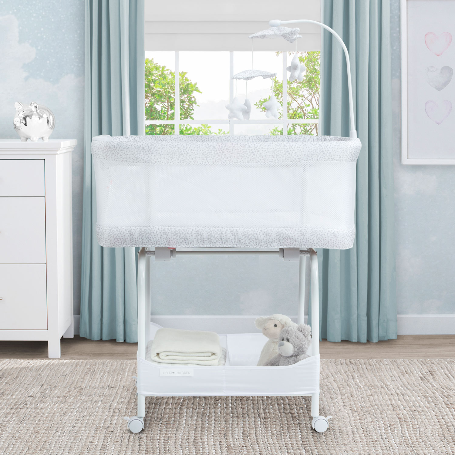 Delta bassinet green outlet and white