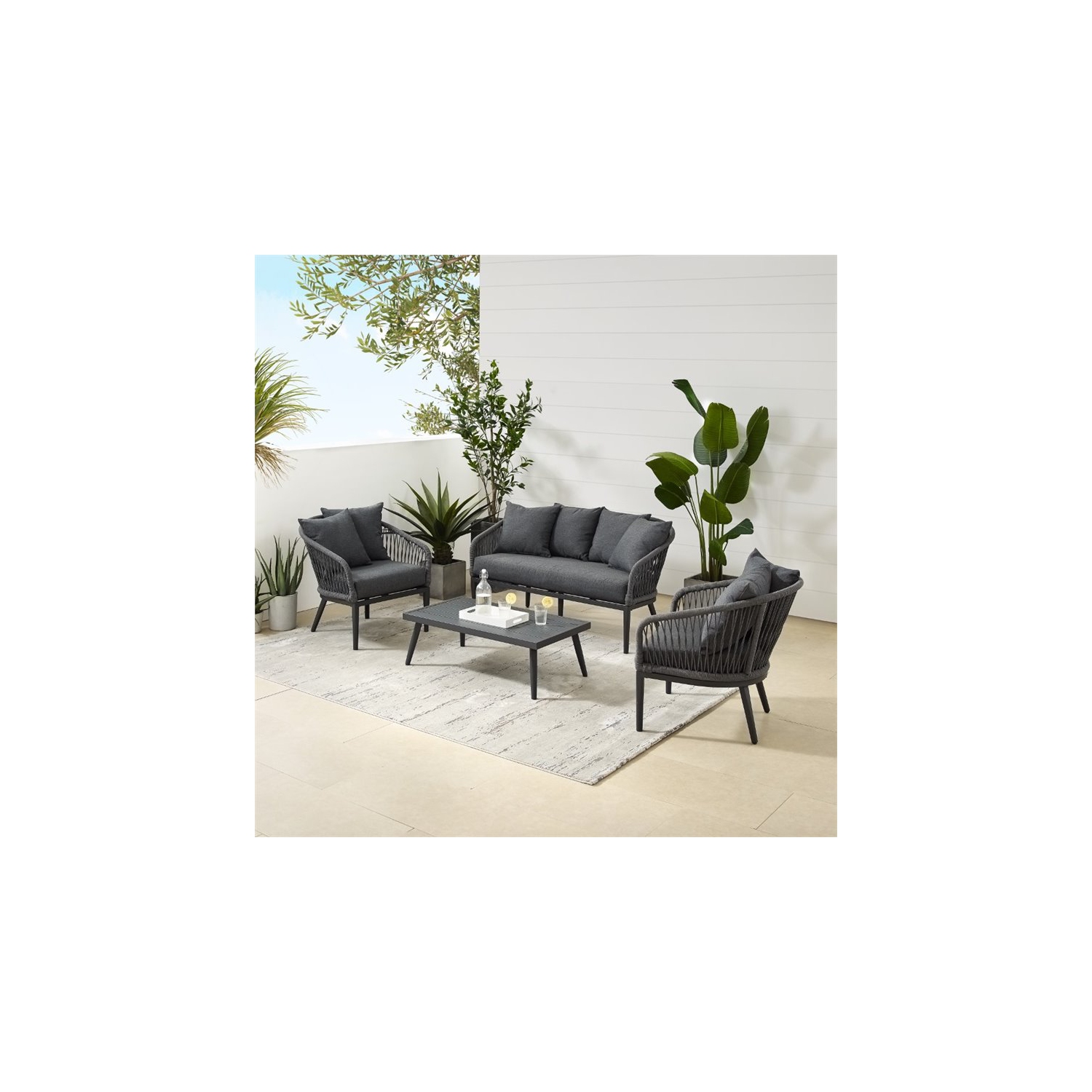 Crosley Furniture Dover 4 Piece Rattan Patio Sofa Set in Charcoal and Black