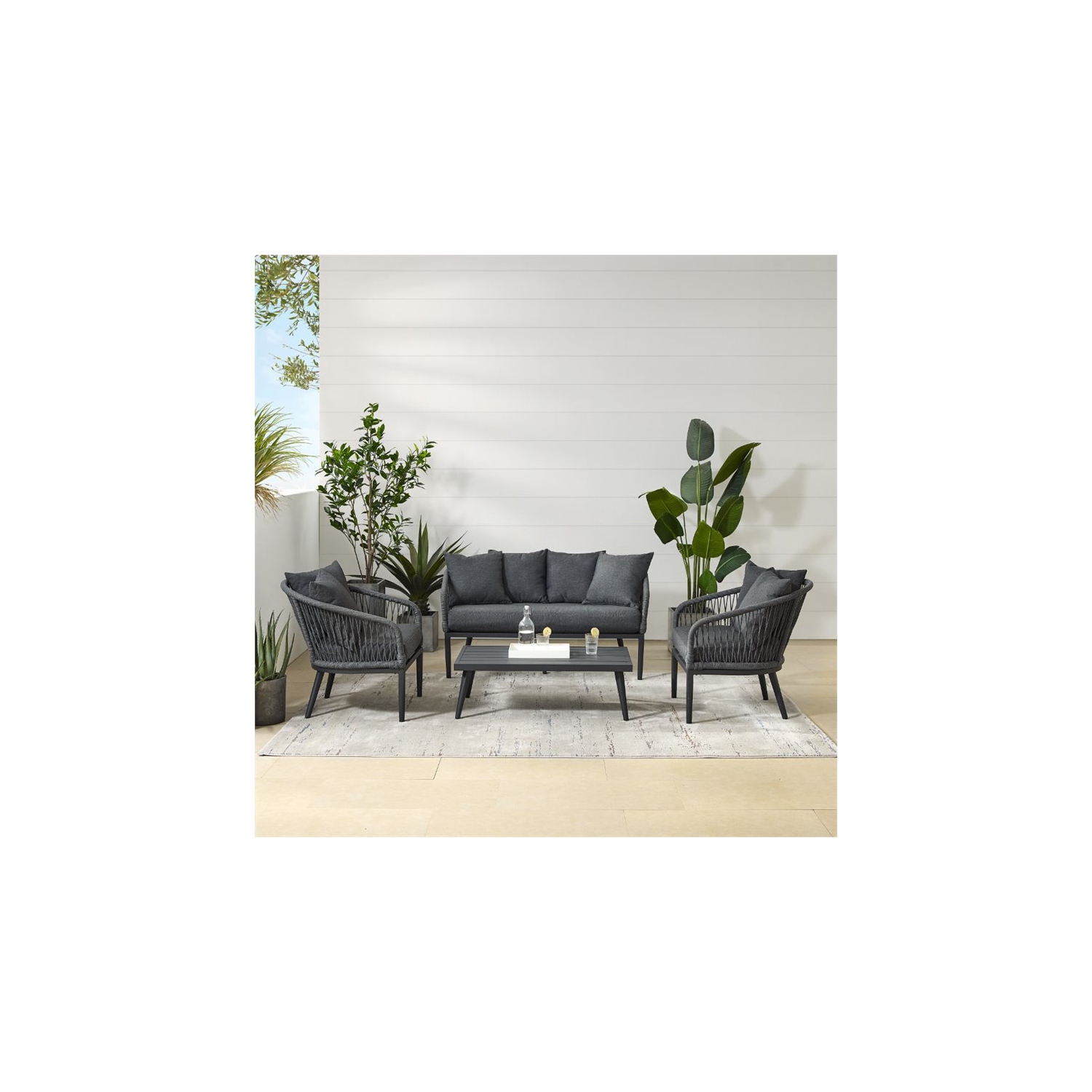 Crosley Furniture Dover 4 Piece Rattan Patio Sofa Set in Charcoal and Black