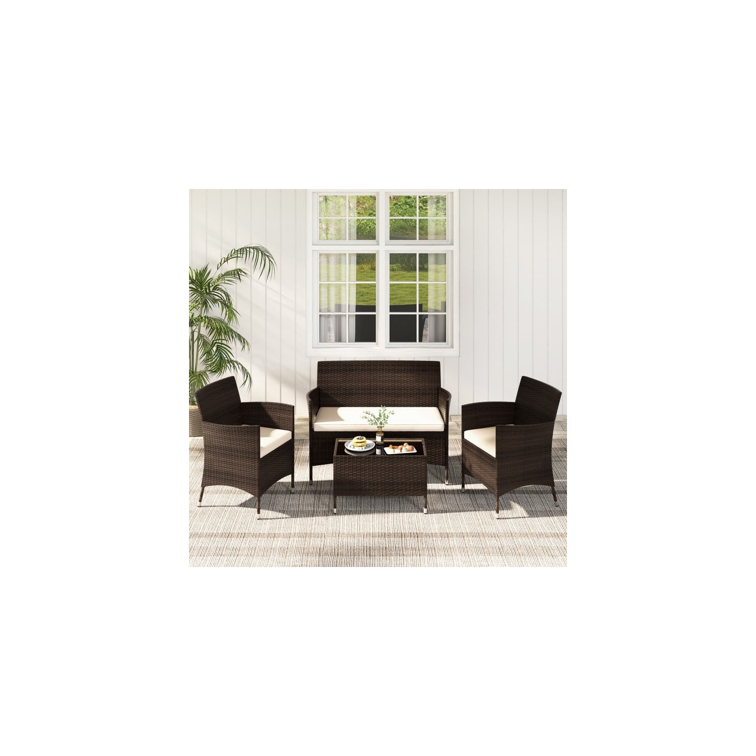 Patio 4-Piece Rattan Sofa Set with Comfortable Cushions and Glass Table