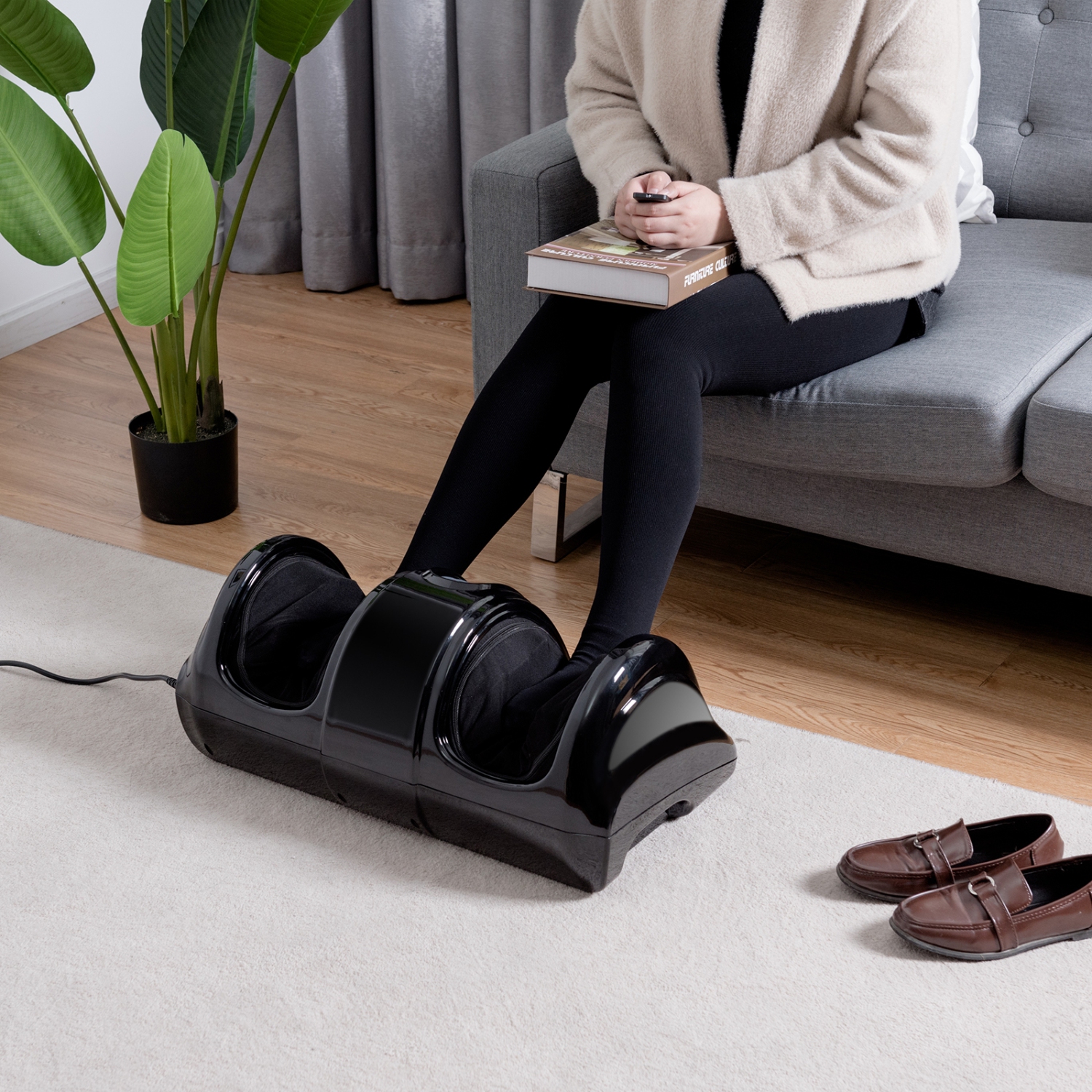 Compact foot massager with high intensity massage rollers for home or office use