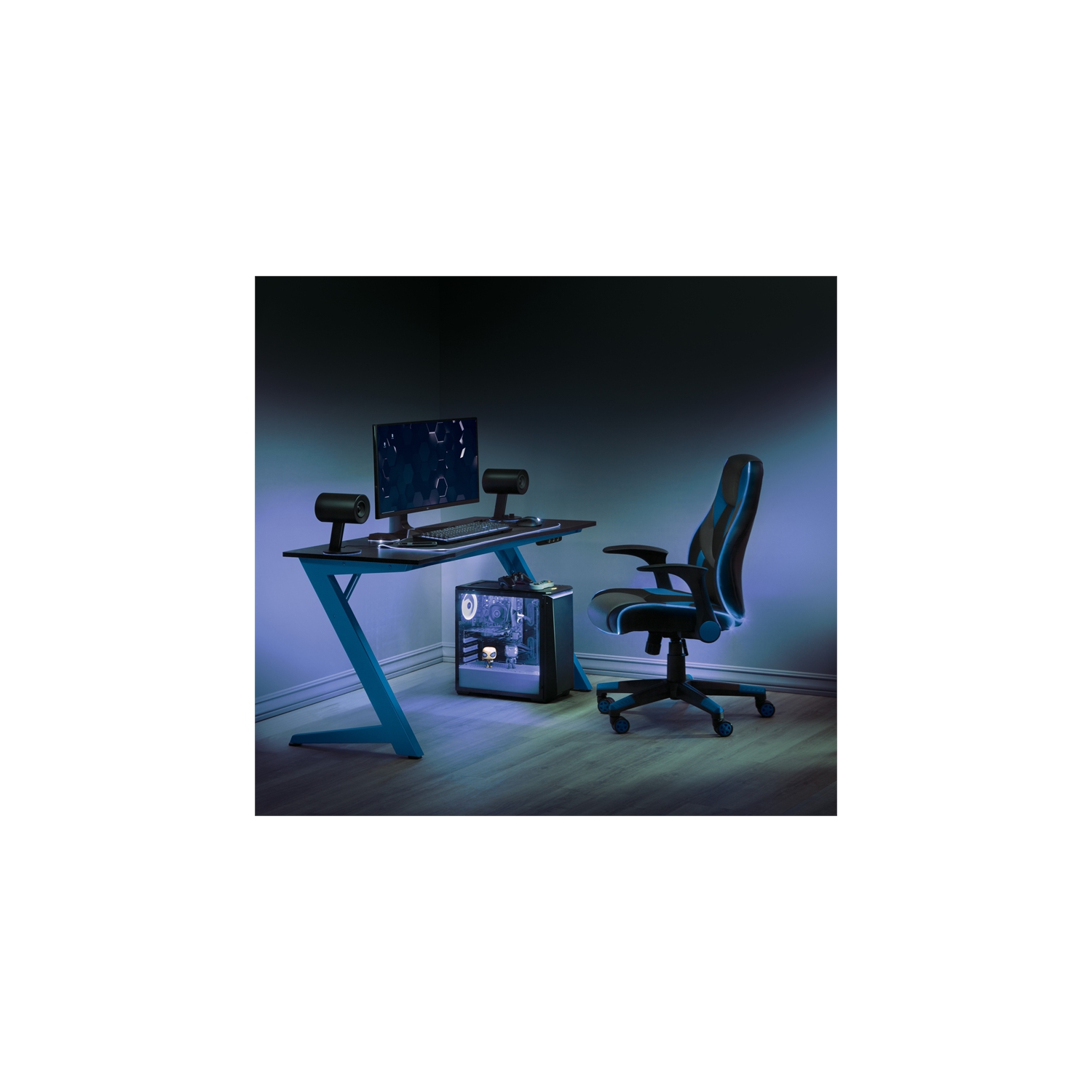 Bureau de jeu BETA Battlestation avec dessus carbone noir et pattes en métal bleu mat