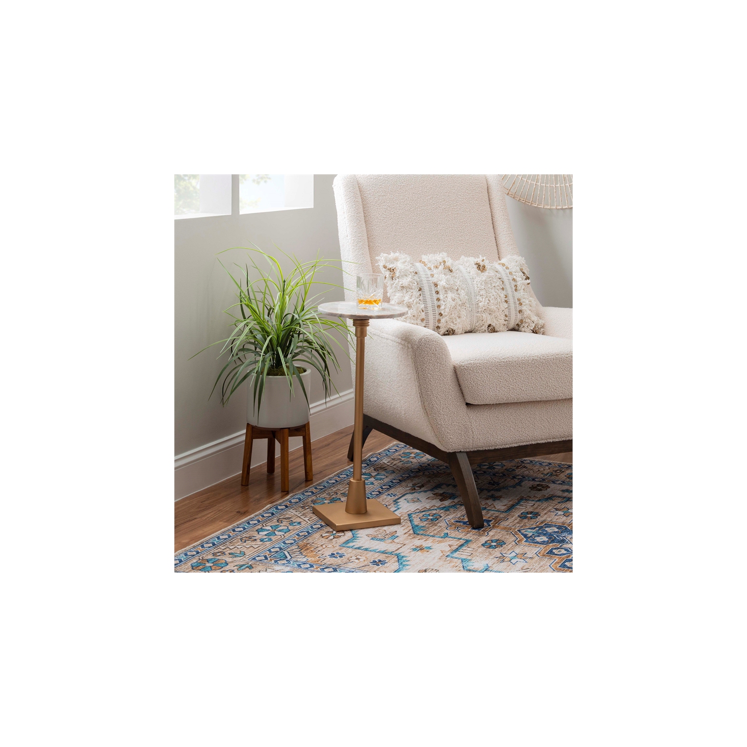 Linon Gavin Adjustable Metal and Sandy Marble Drink Table in Gold