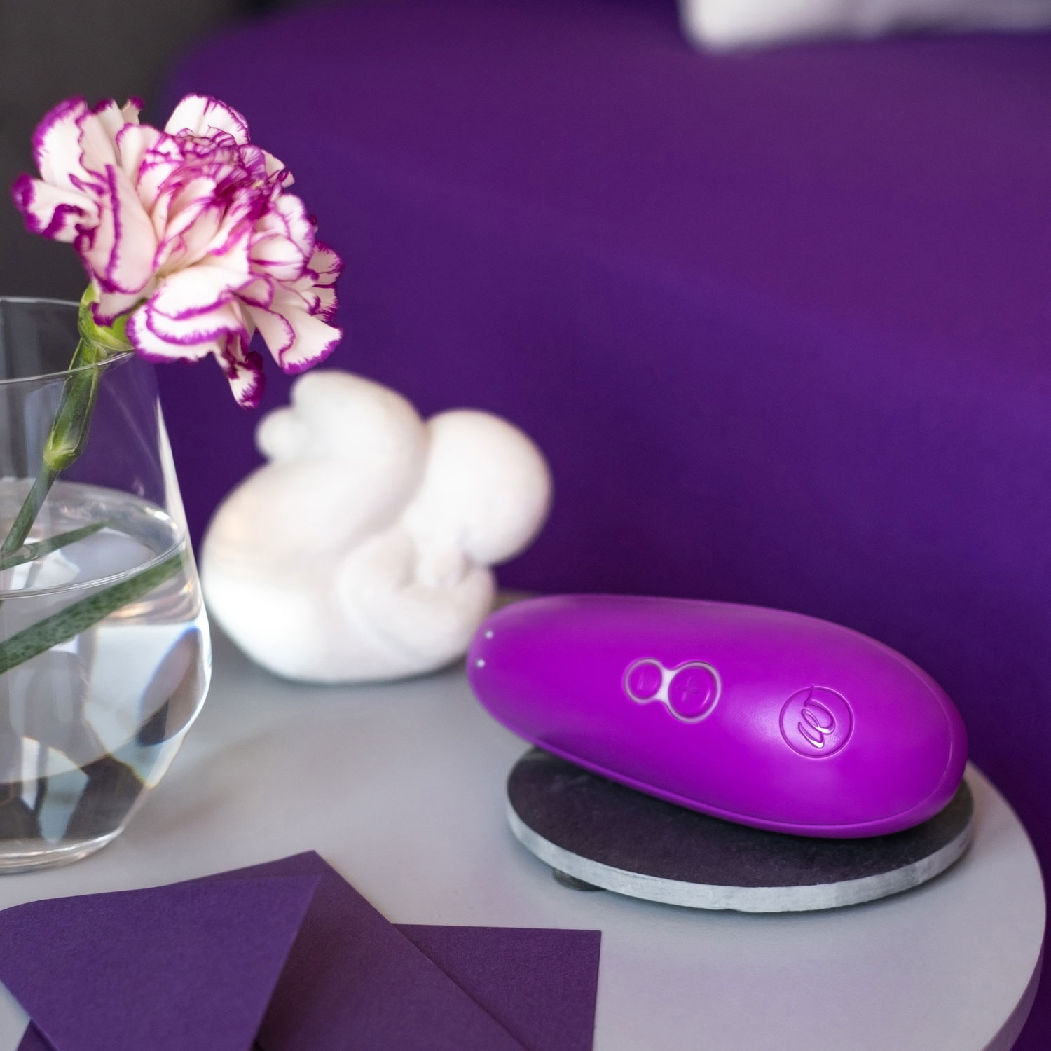 Stimulateur compact Pleasure Air Starlet 3 de Womanizer - Violet