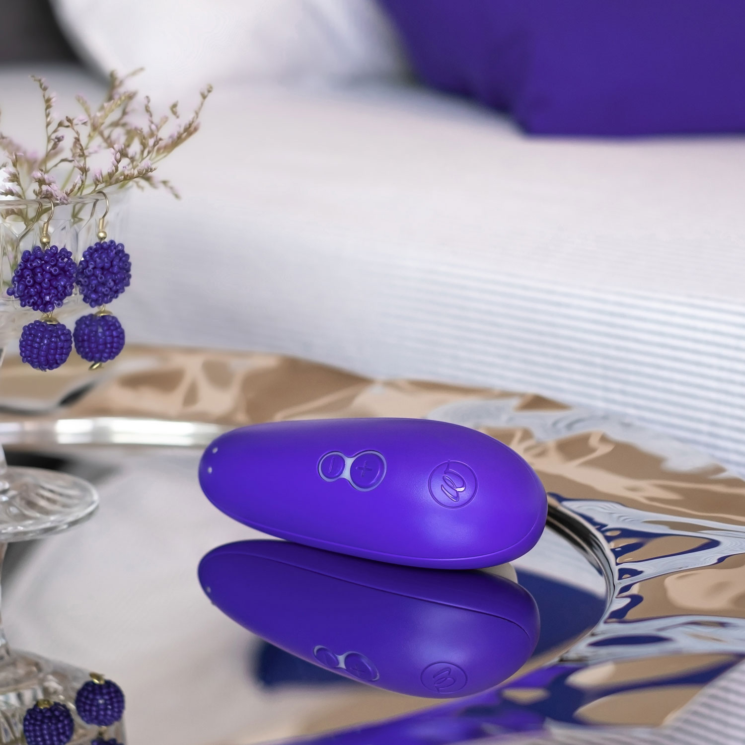 Stimulateur compact Pleasure Air Starlet 3 de Womanizer - Indigo