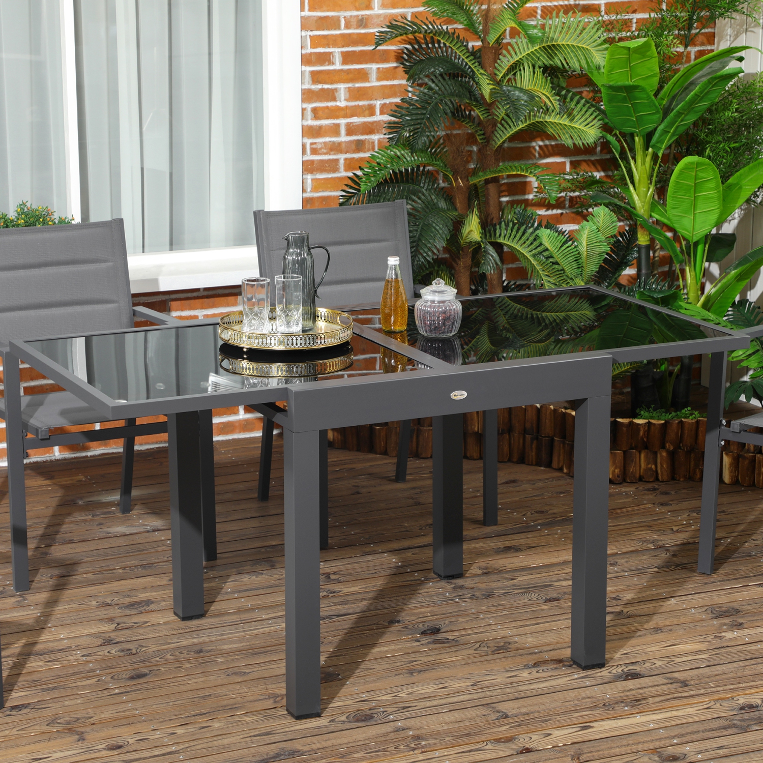 Outsunny 63" Extendable Outdoor Dining Table Patio Table with Aluminum Frame and Tempered Glass Tabletop, Black