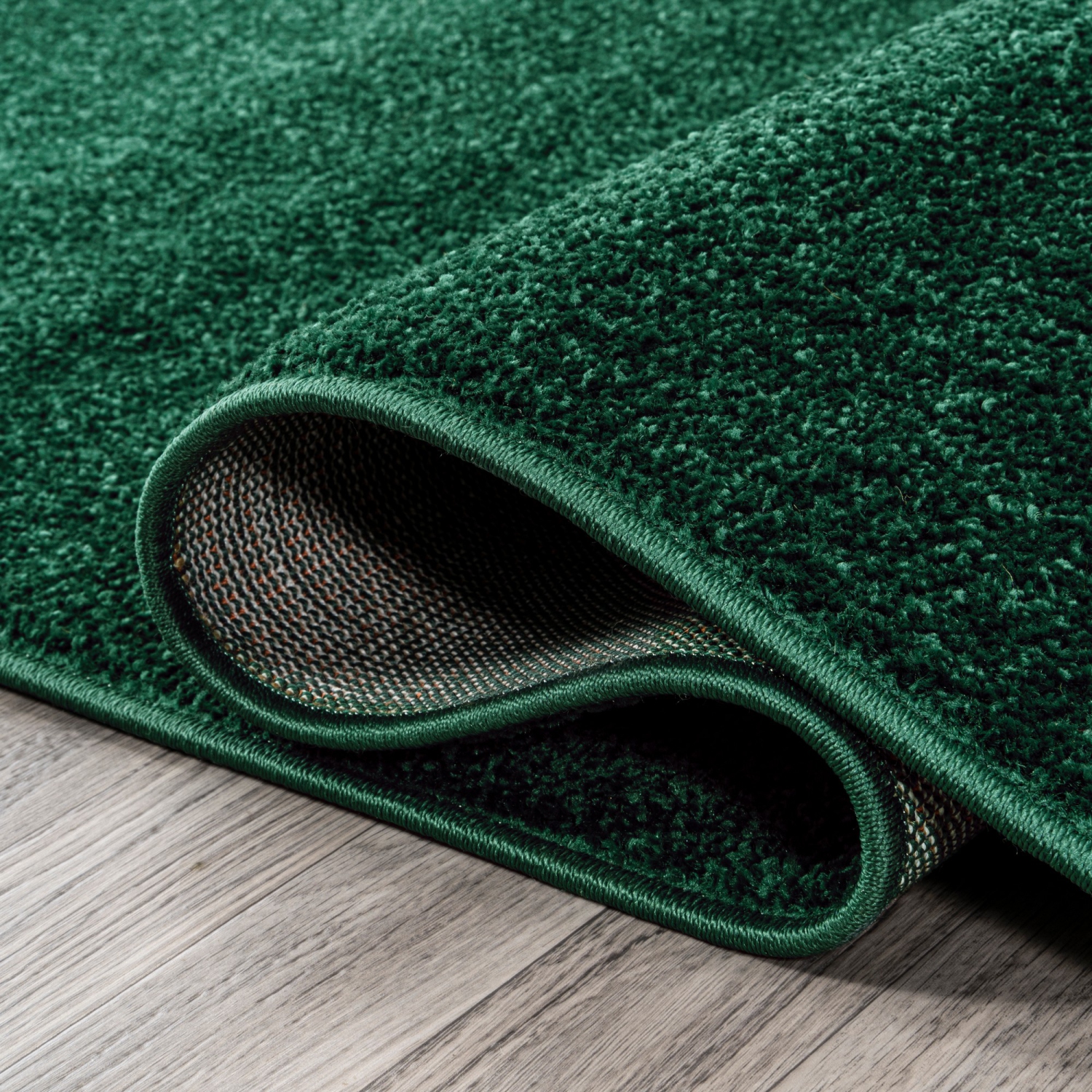 Haze Solid Low Pile Area Rug Emerald