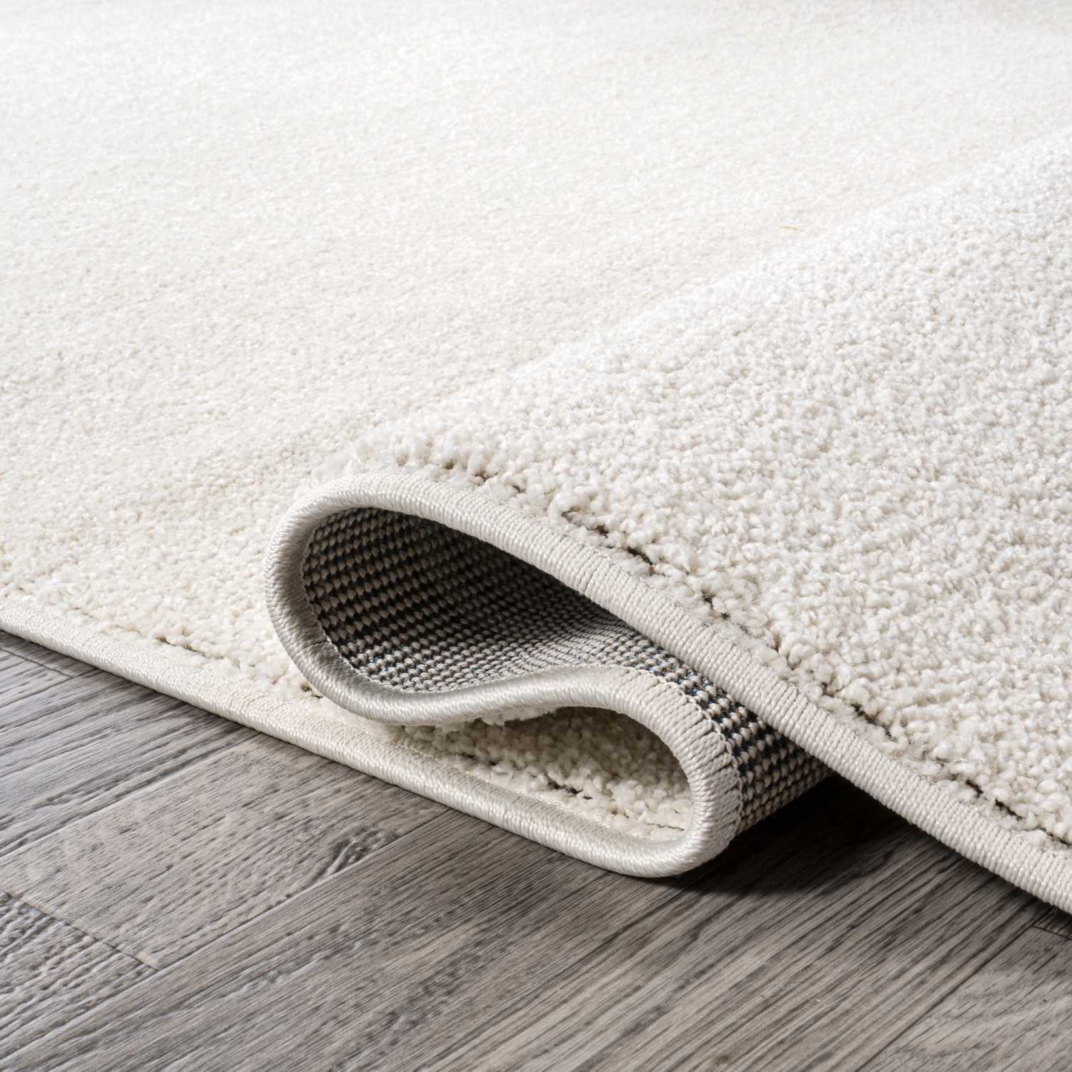 Haze Solid Low Pile Area Rug Cream