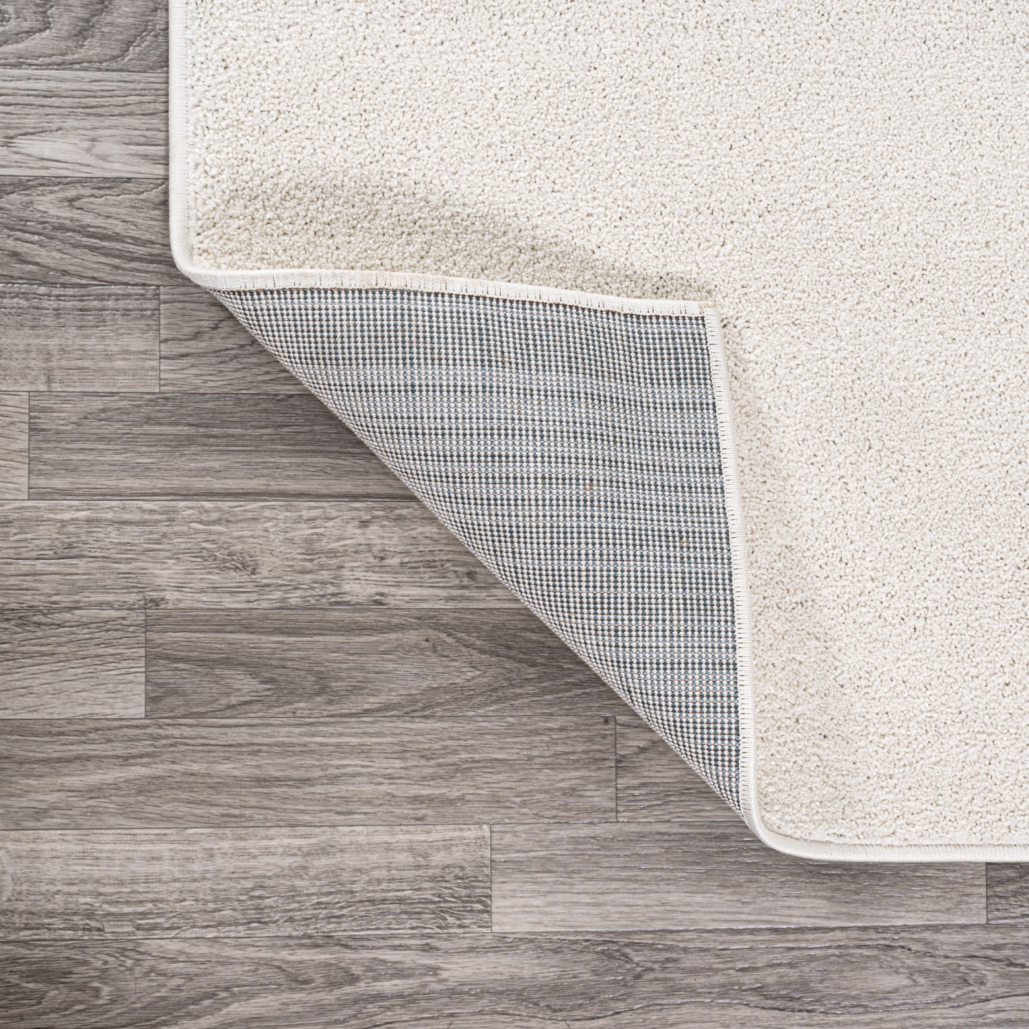 Haze Solid Low Pile Area Rug Cream