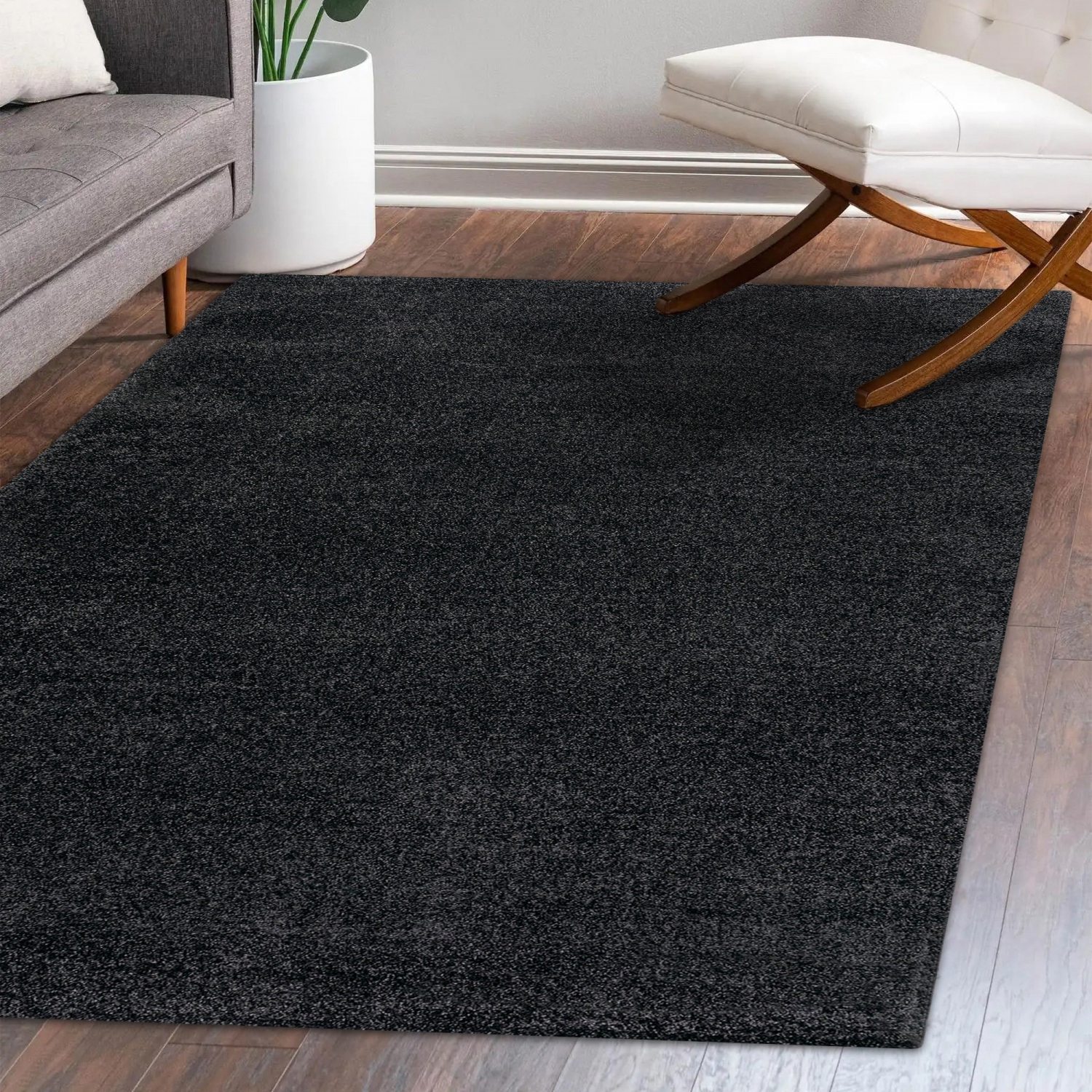 Haze Solid Low Pile Area Rug Black