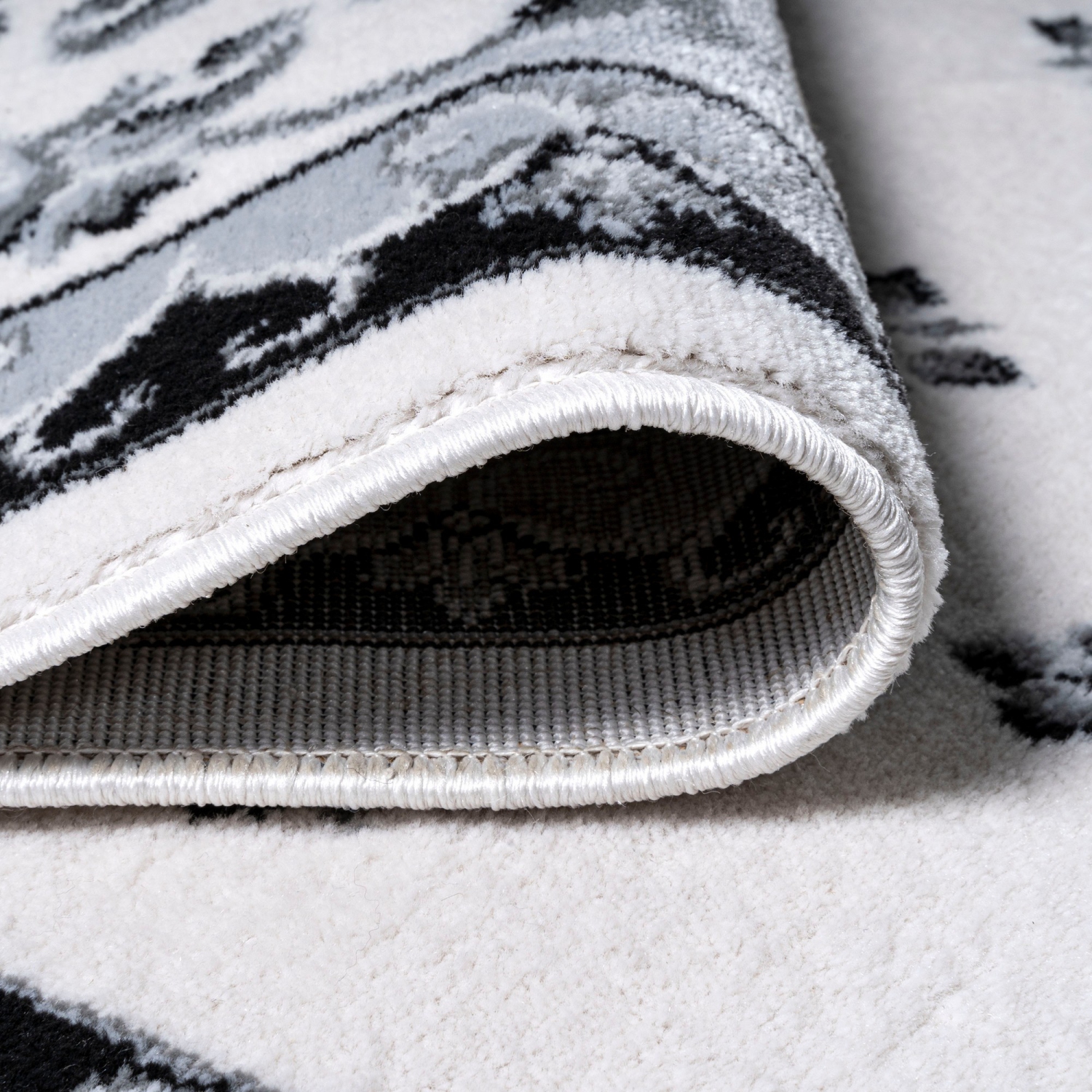 Carpette Acanthus à bordure française