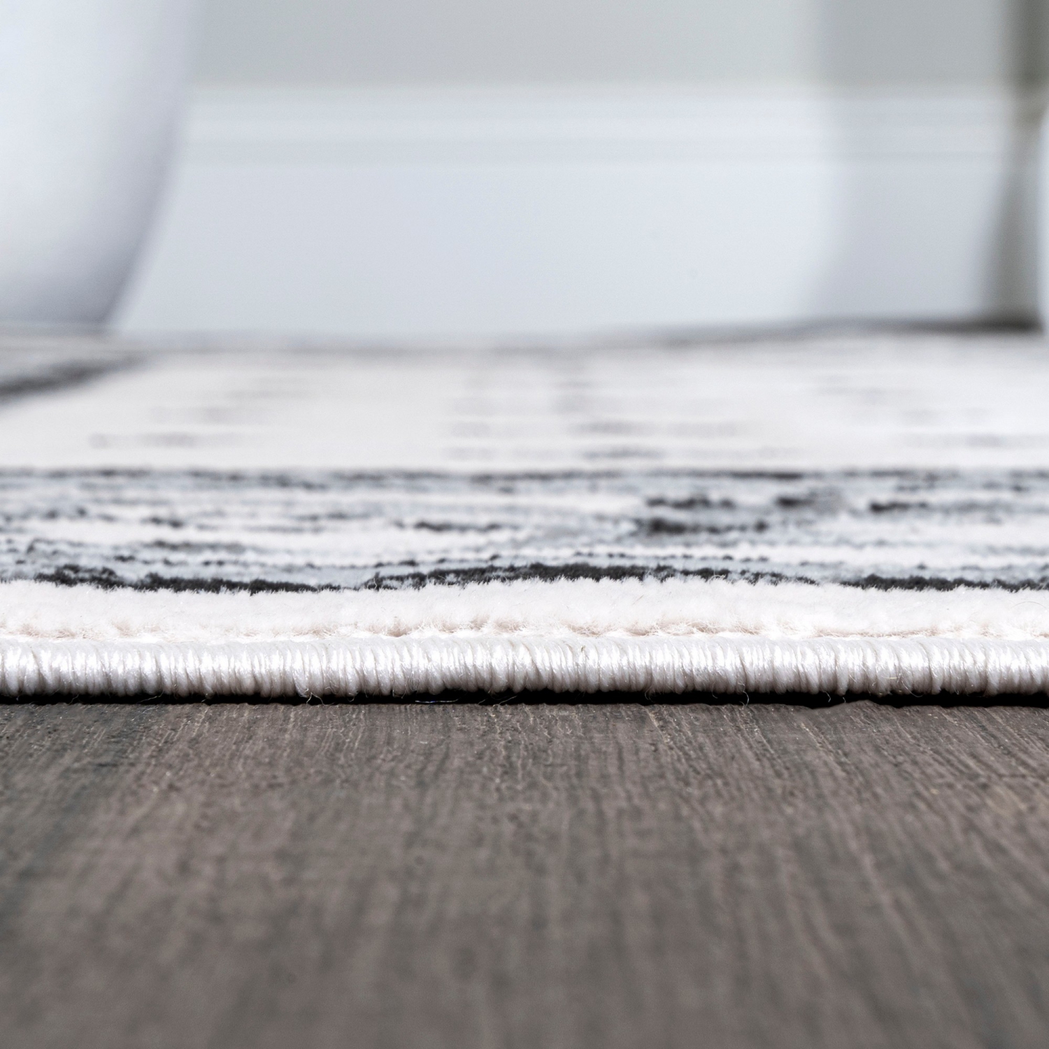 Carpette Acanthus à bordure française