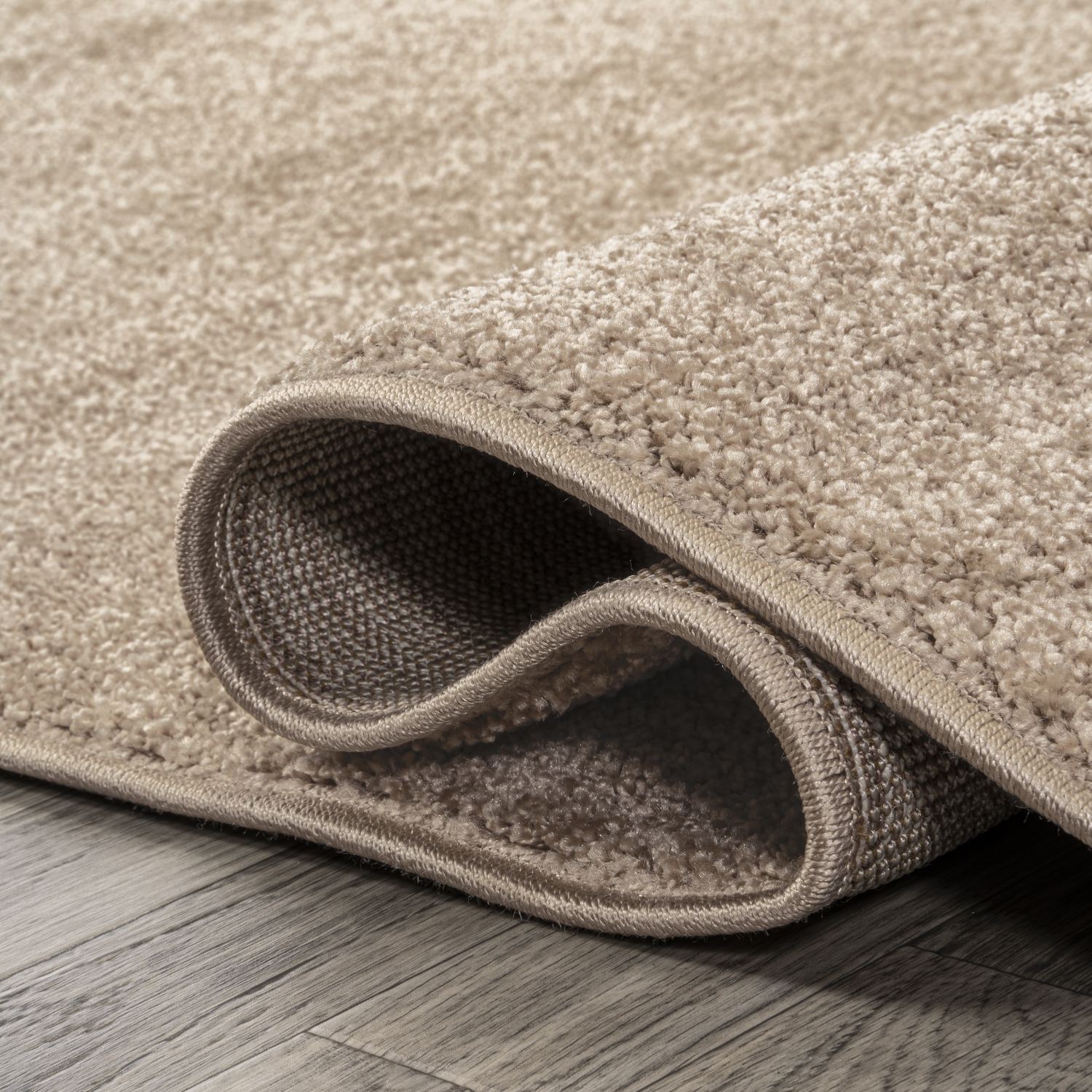 Haze Solid Low Pile Area Rug Beige