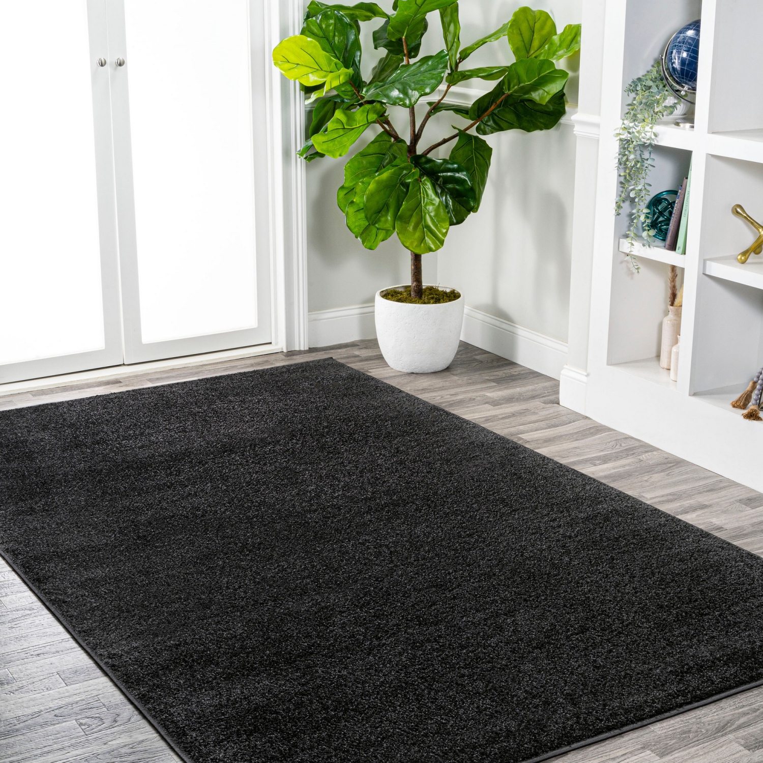 Haze Solid Low Pile Area Rug Black