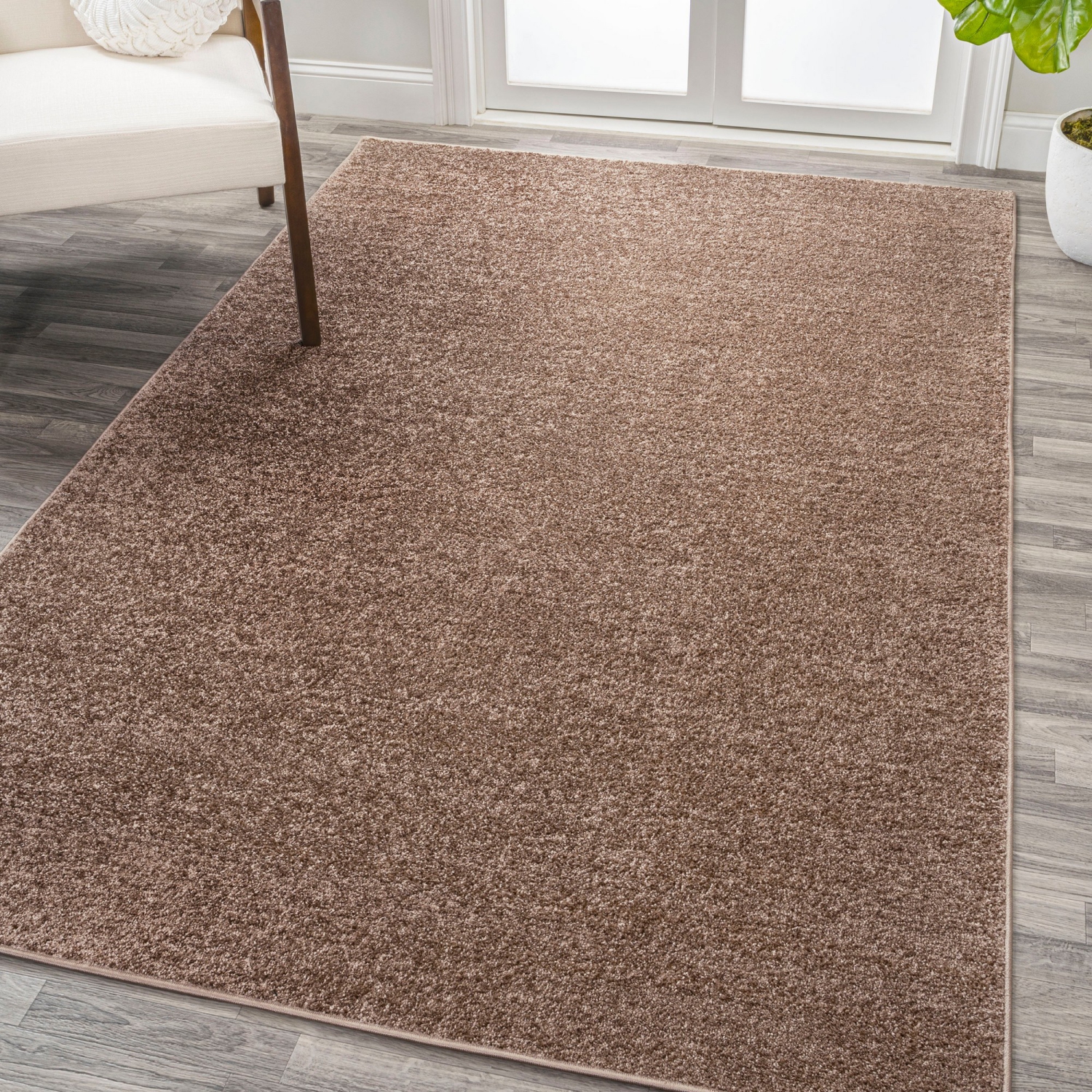 Haze Solid Low Pile Area Rug Brown