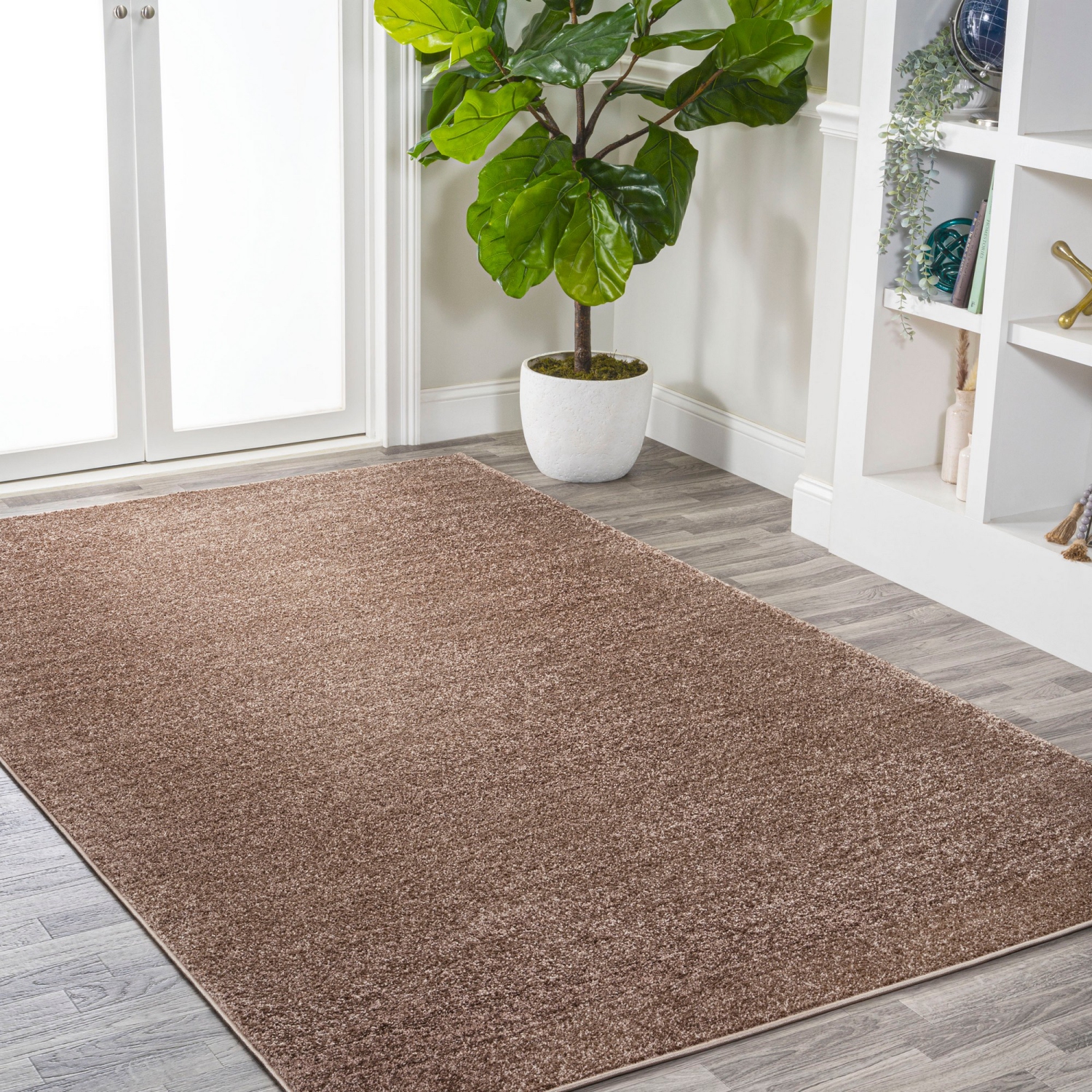 Haze Solid Low Pile Area Rug Brown