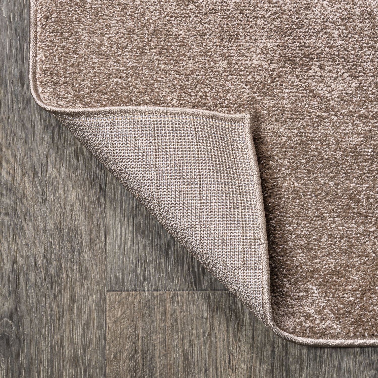 Haze Solid Low Pile Area Rug Brown