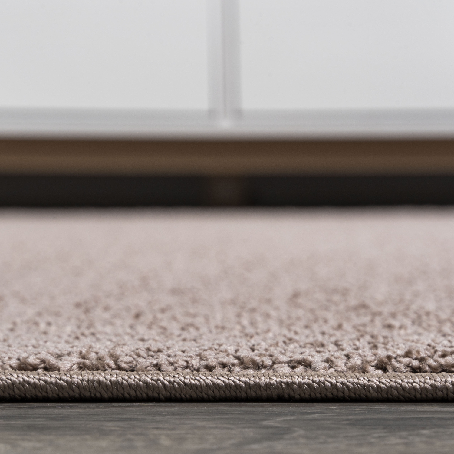 Haze Solid Low Pile Area Rug Brown