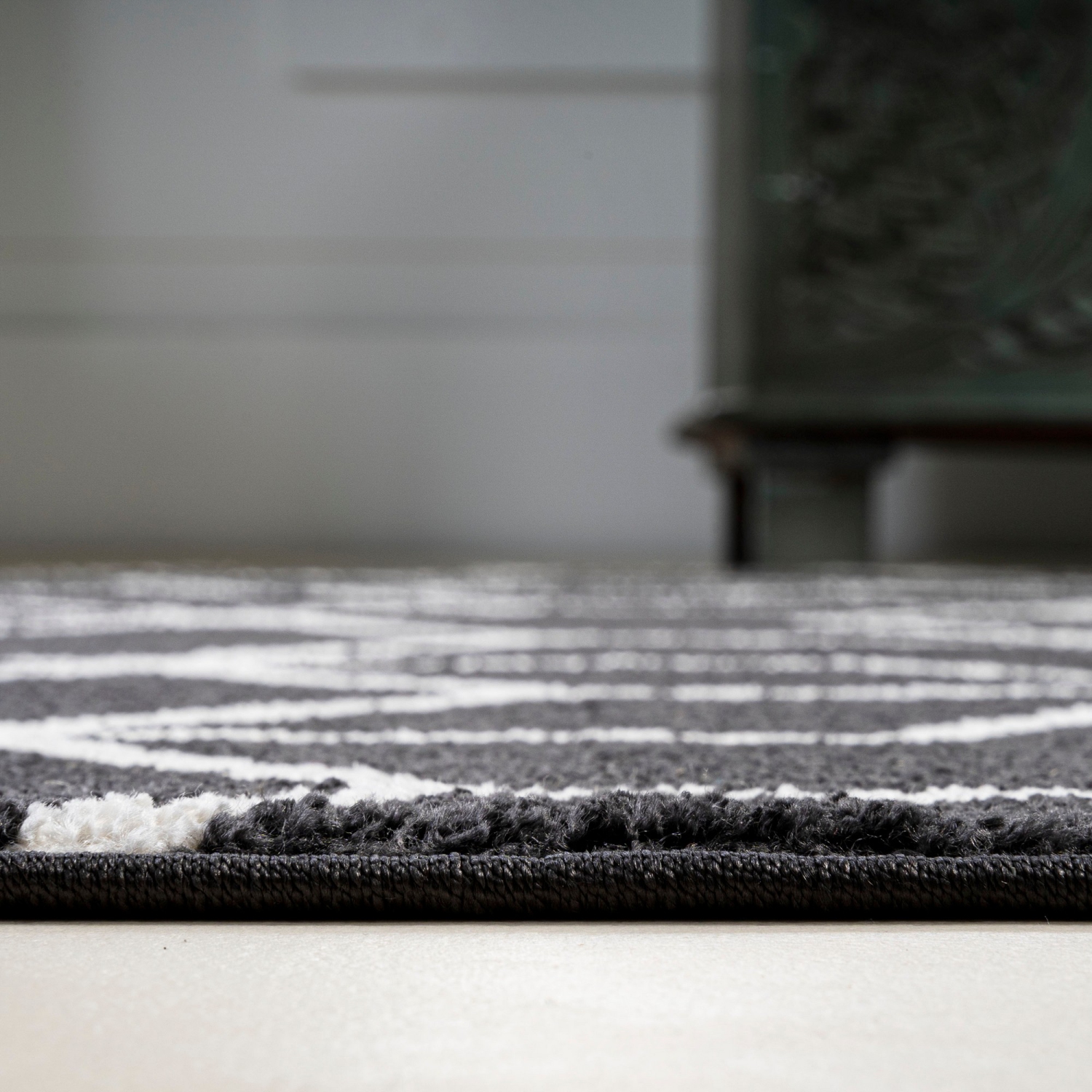 Tapis moderne à motif géométrique culbutant