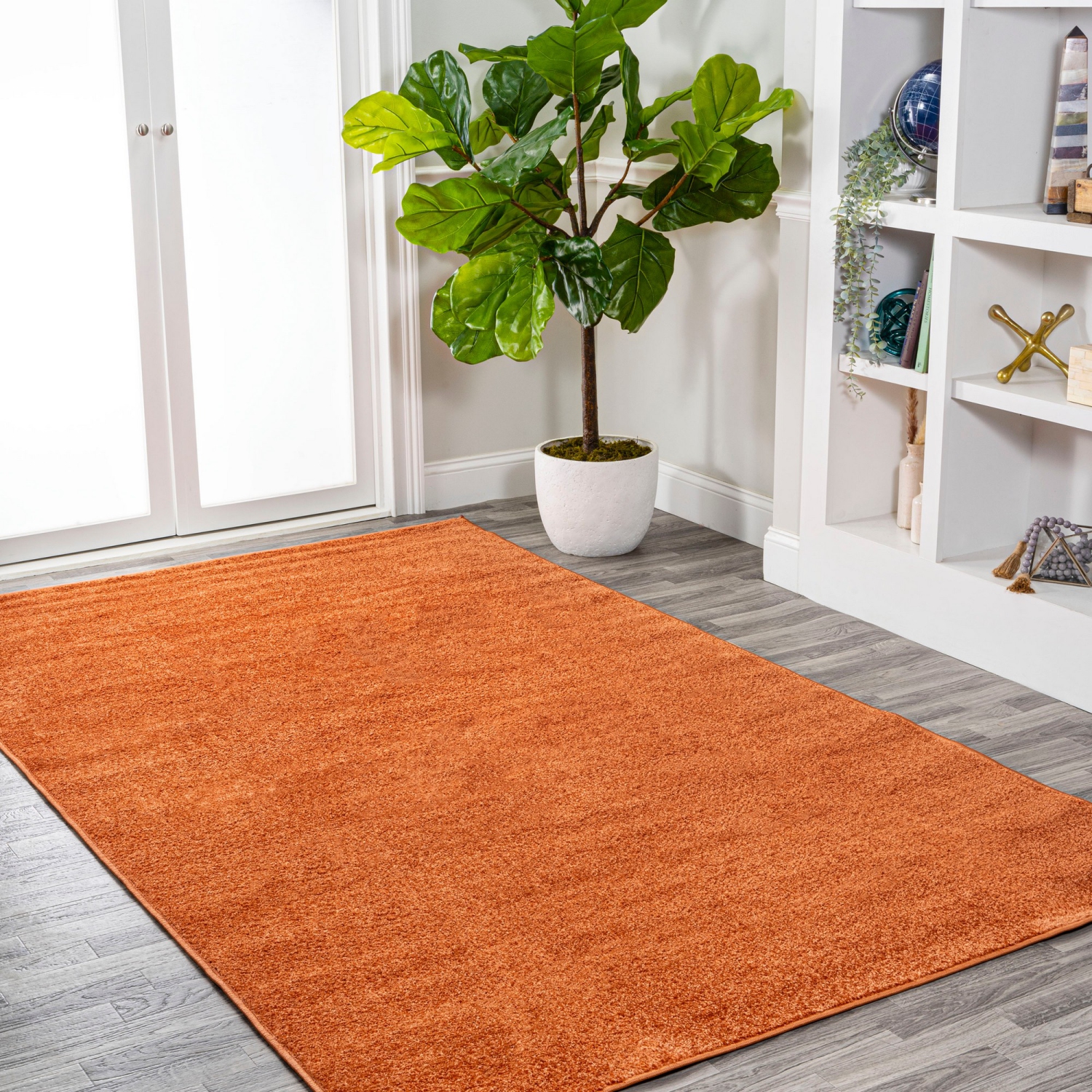 Haze Solid Low Pile Area Rug Orange