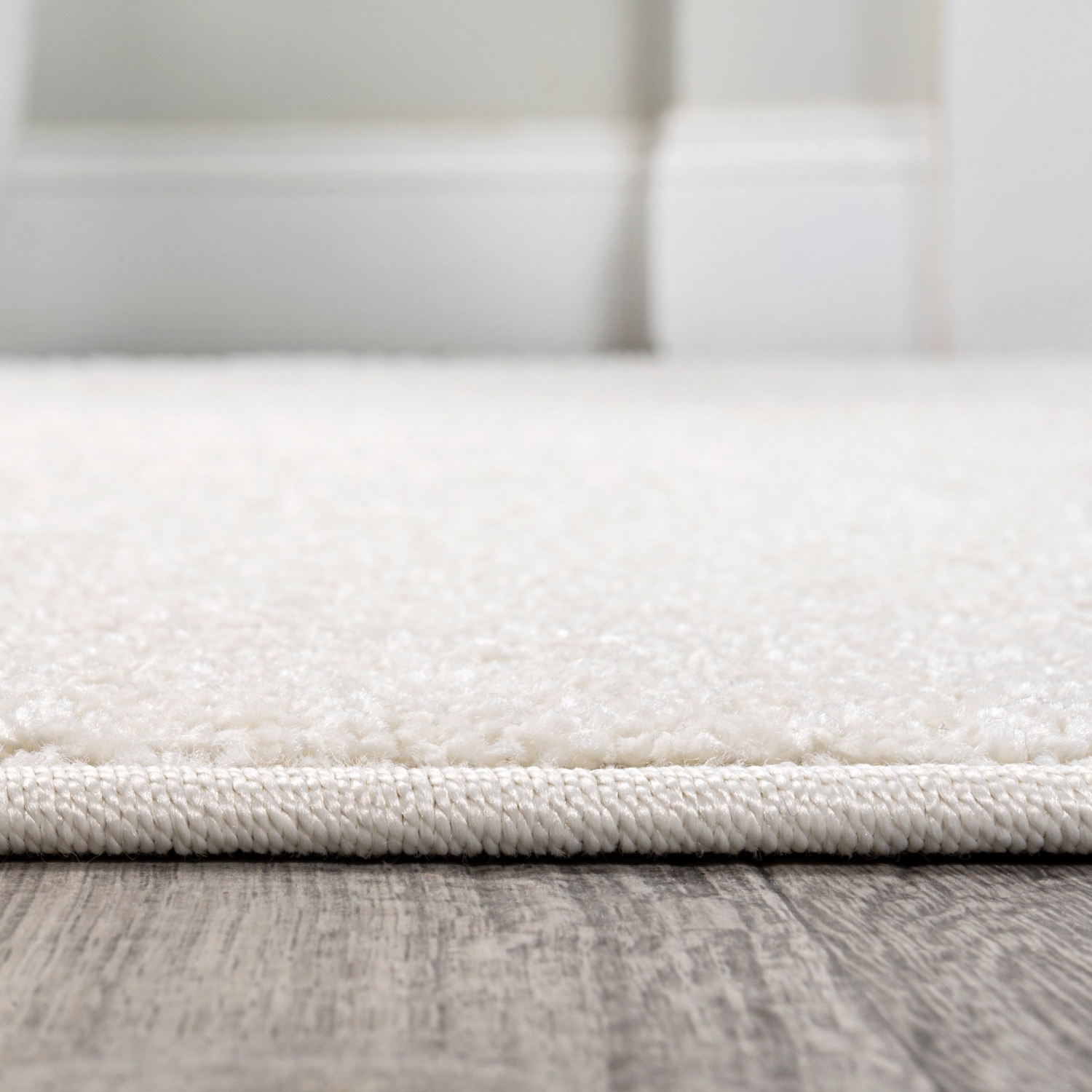 Haze Solid Low Pile Area Rug Cream