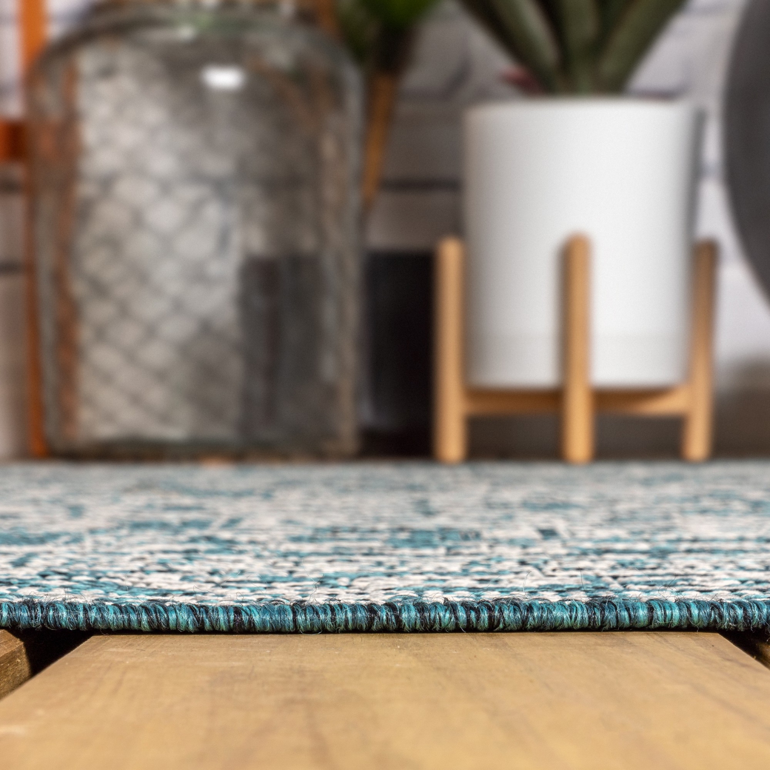 Tapis d'intérieur/d'extérieur Sinjuri à motif de médaillon texturé