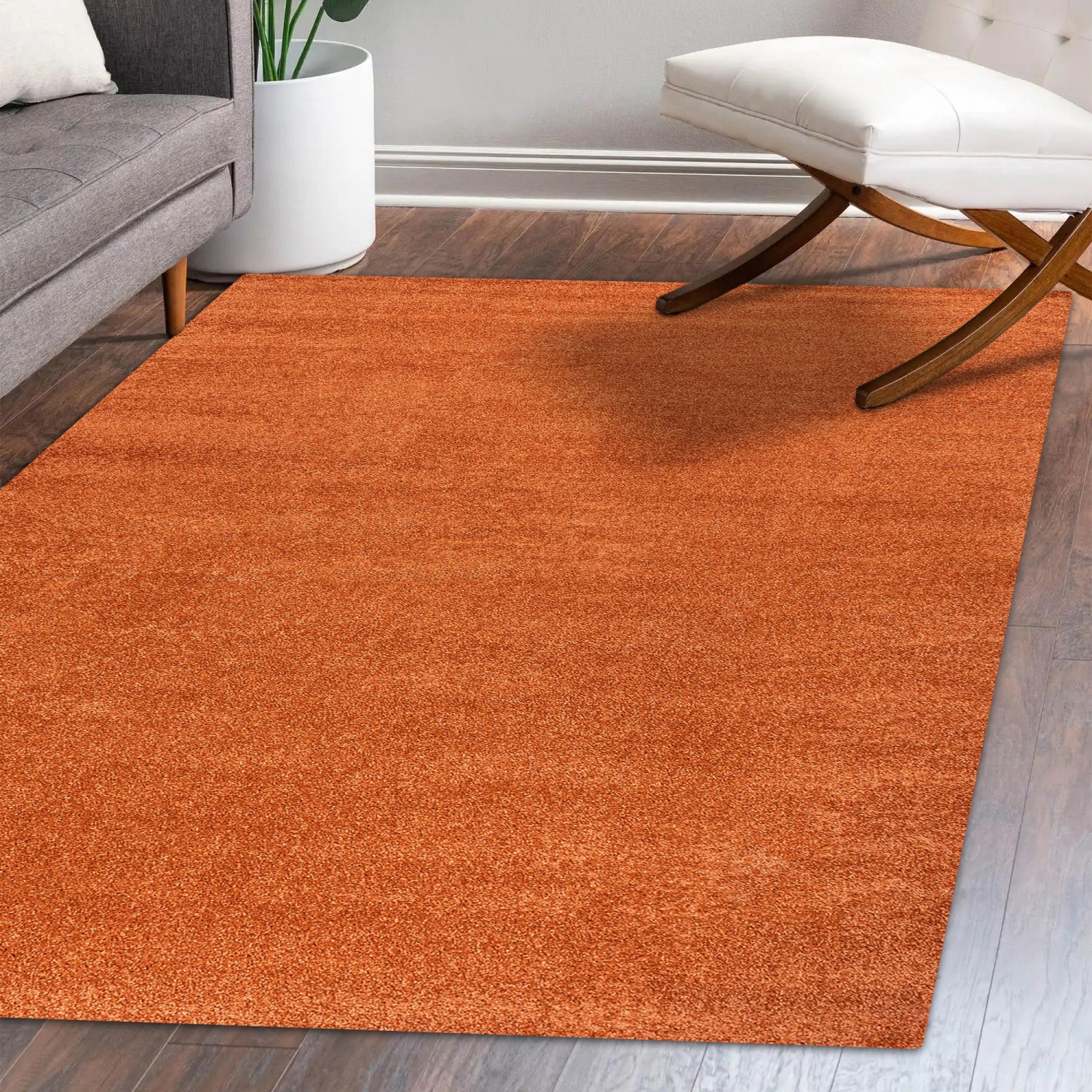 Haze Solid Low Pile Area Rug Orange