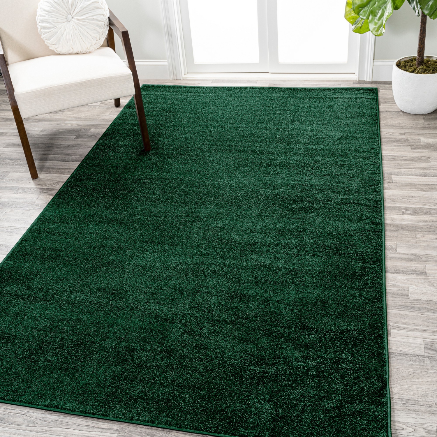 Haze Solid Low Pile Area Rug Emerald