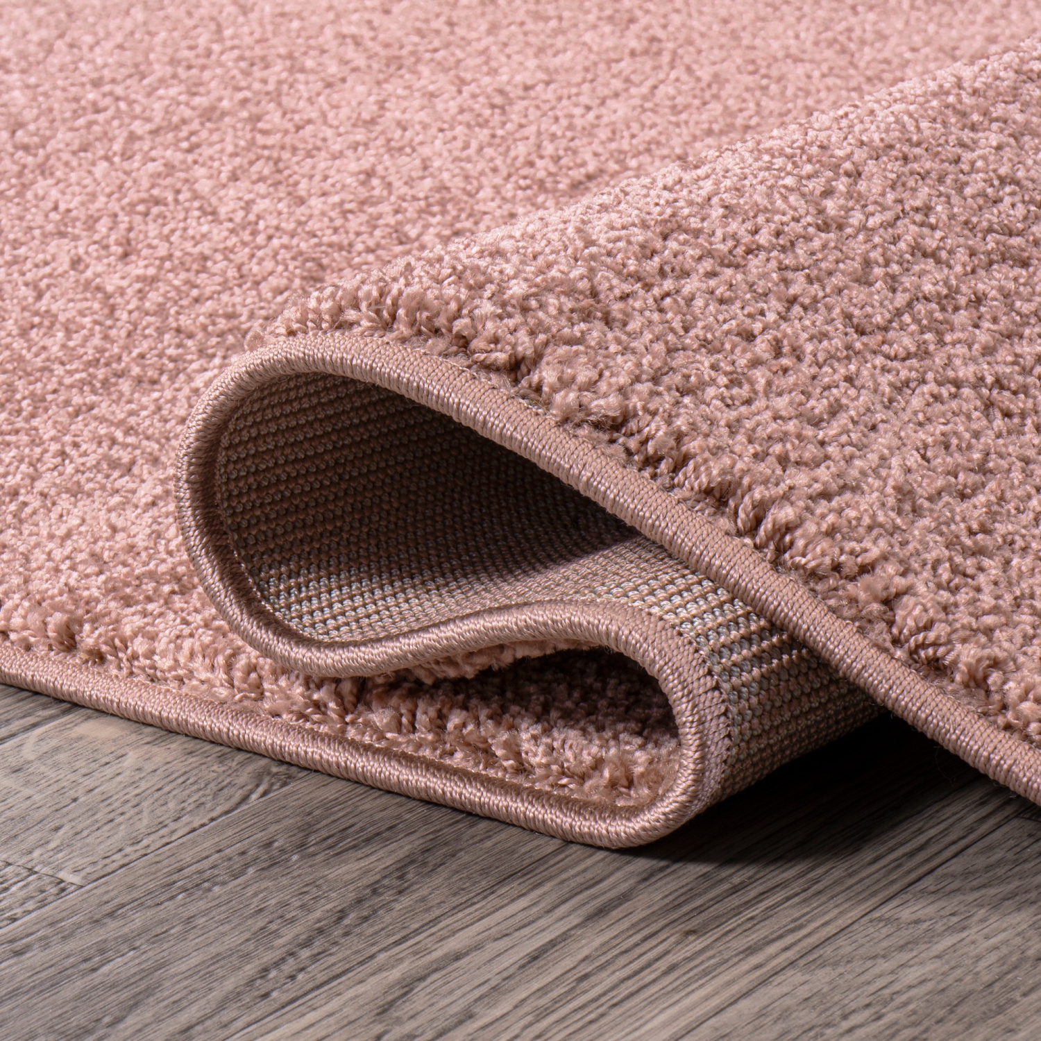 Haze Solid Low Pile Area Rug Pink