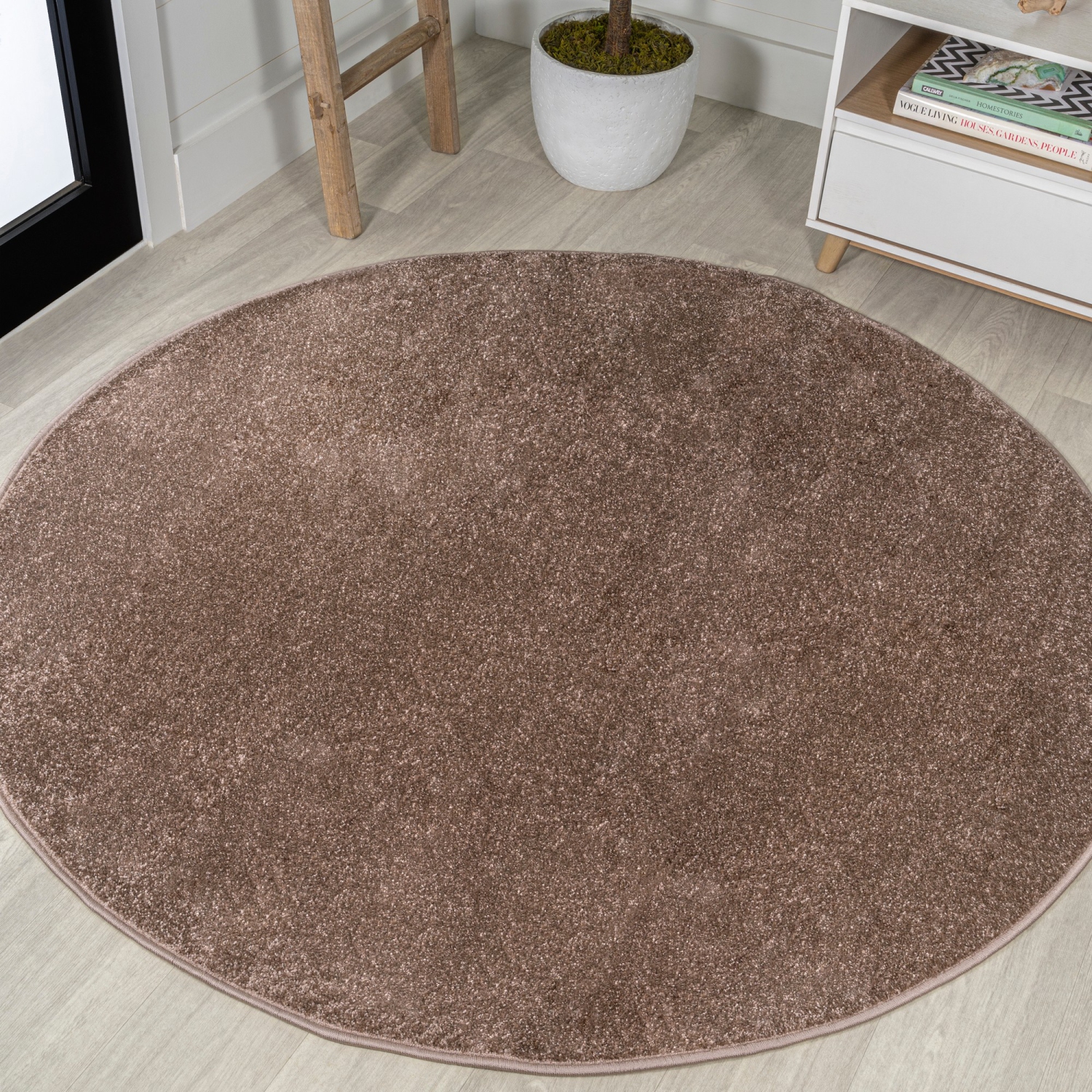 Haze Solid Low Pile Area Rug Brown
