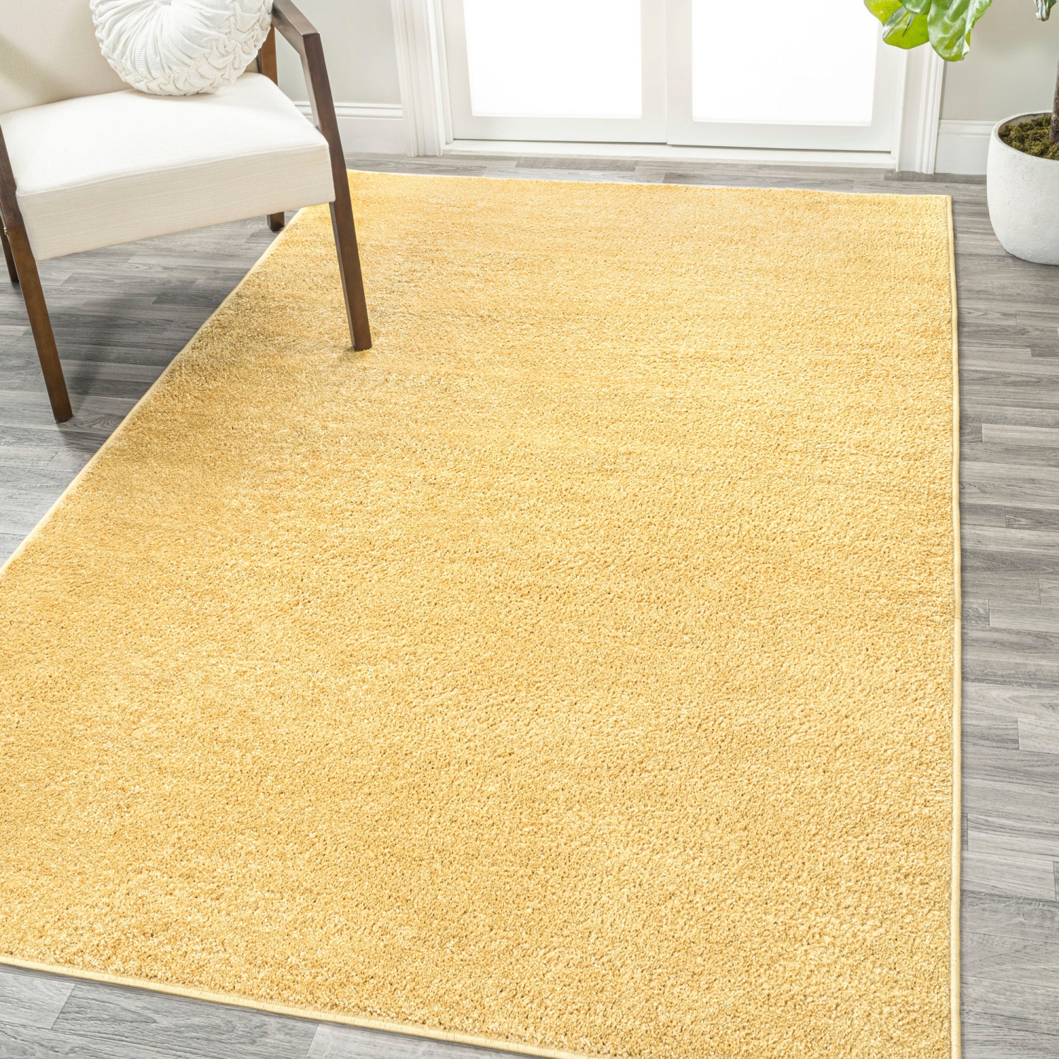 Haze Solid Low Pile Area Rug Mustard