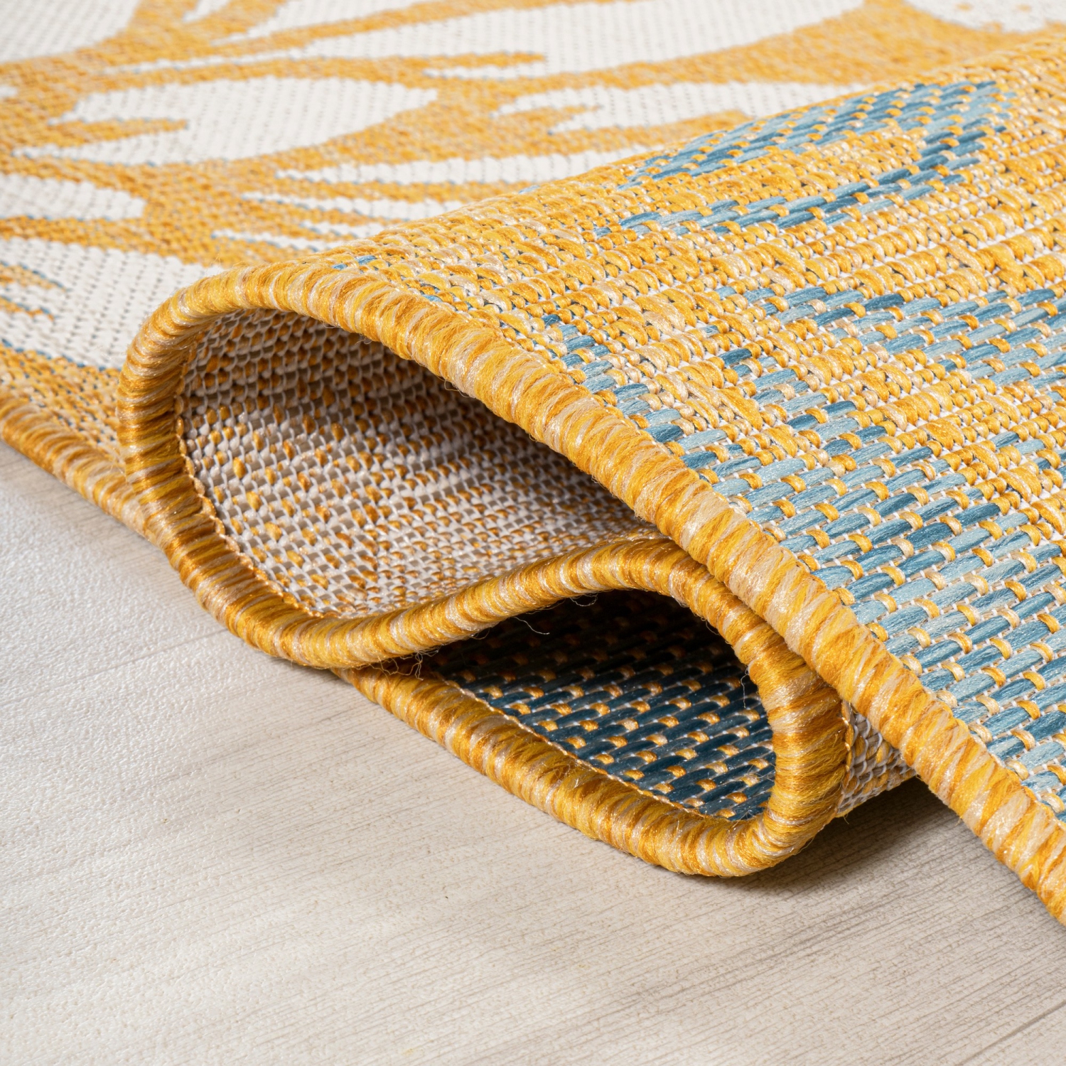 Tapis moderne tissé texturé à motif floral pour l'intérieur et l'extérieur Zinnia