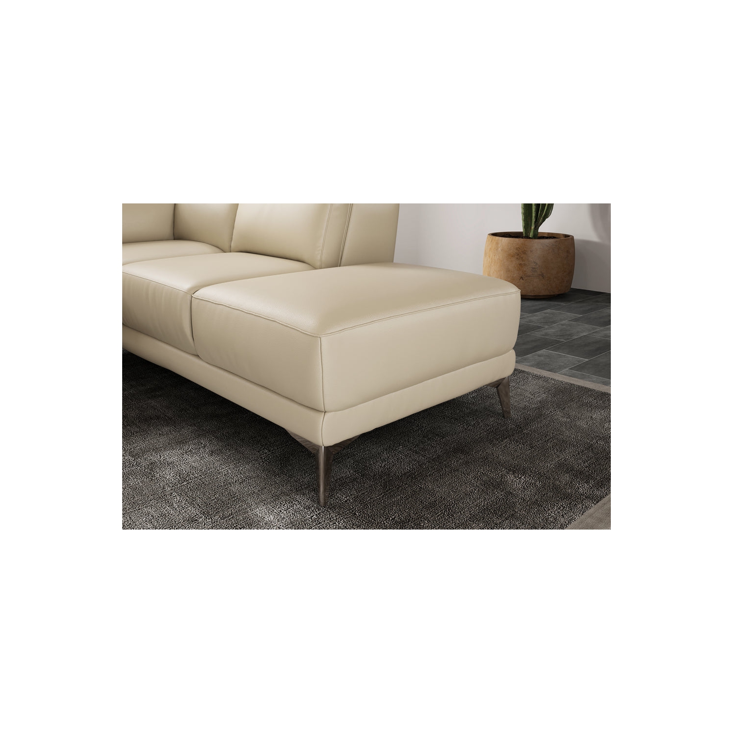 Valencia Pista, divan modulaire contemporain en cuir pleine fleur beige et fauteuil orienté à droite