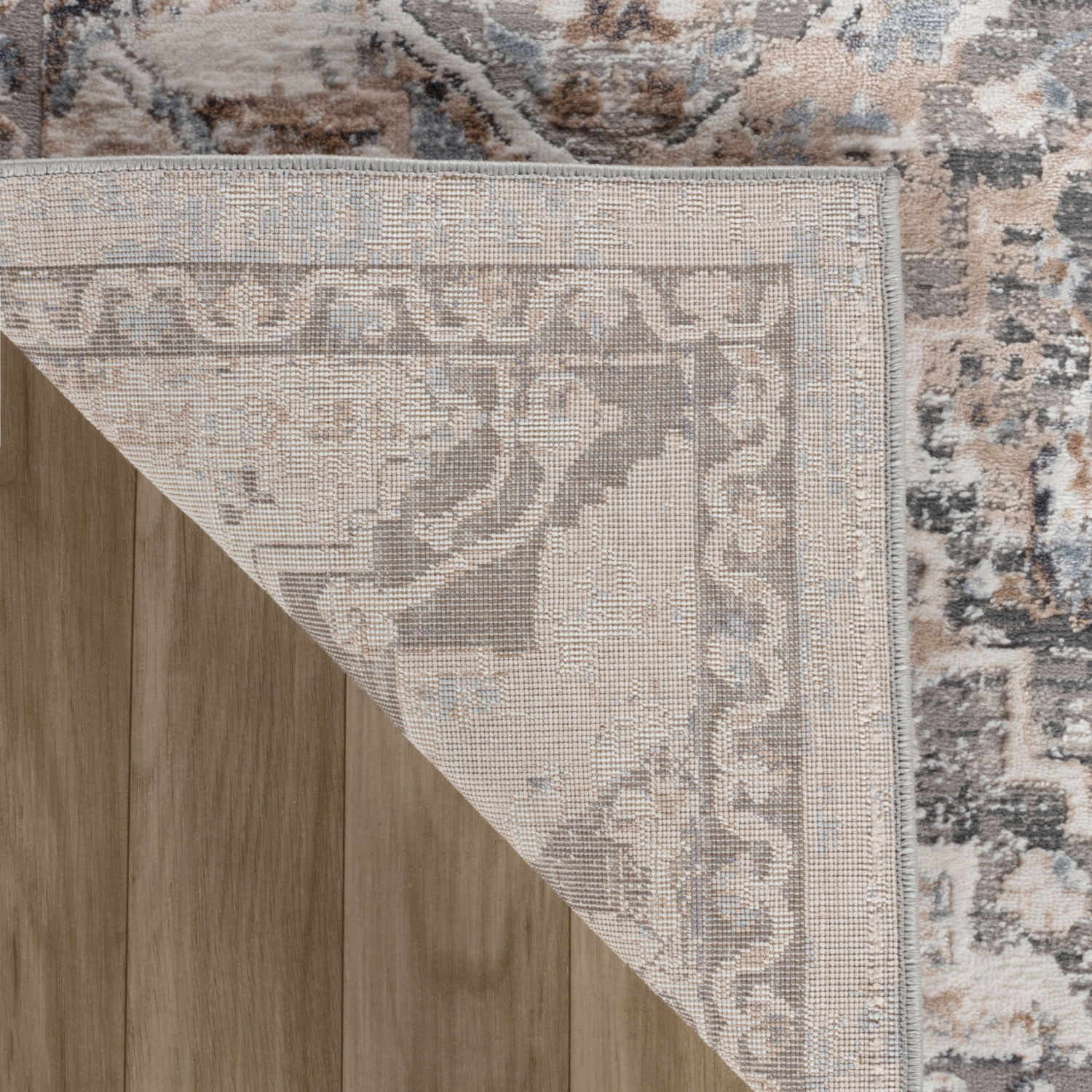 Tapis d'intérieur traditionnel à motif médaillon en losanges gris/beige Sukoon