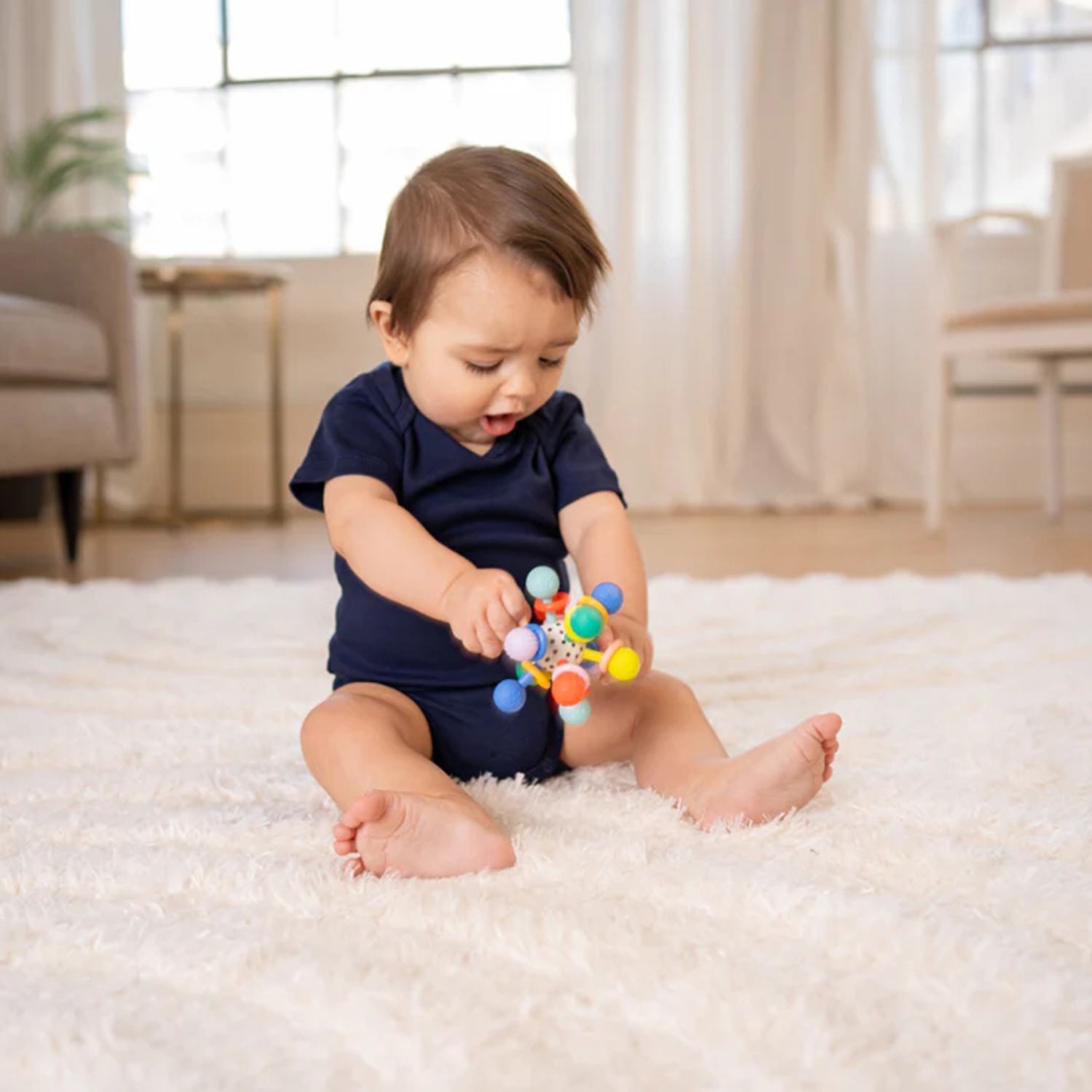 Jouet sensoriel pour bébé Atom Colorpop de Manhattan