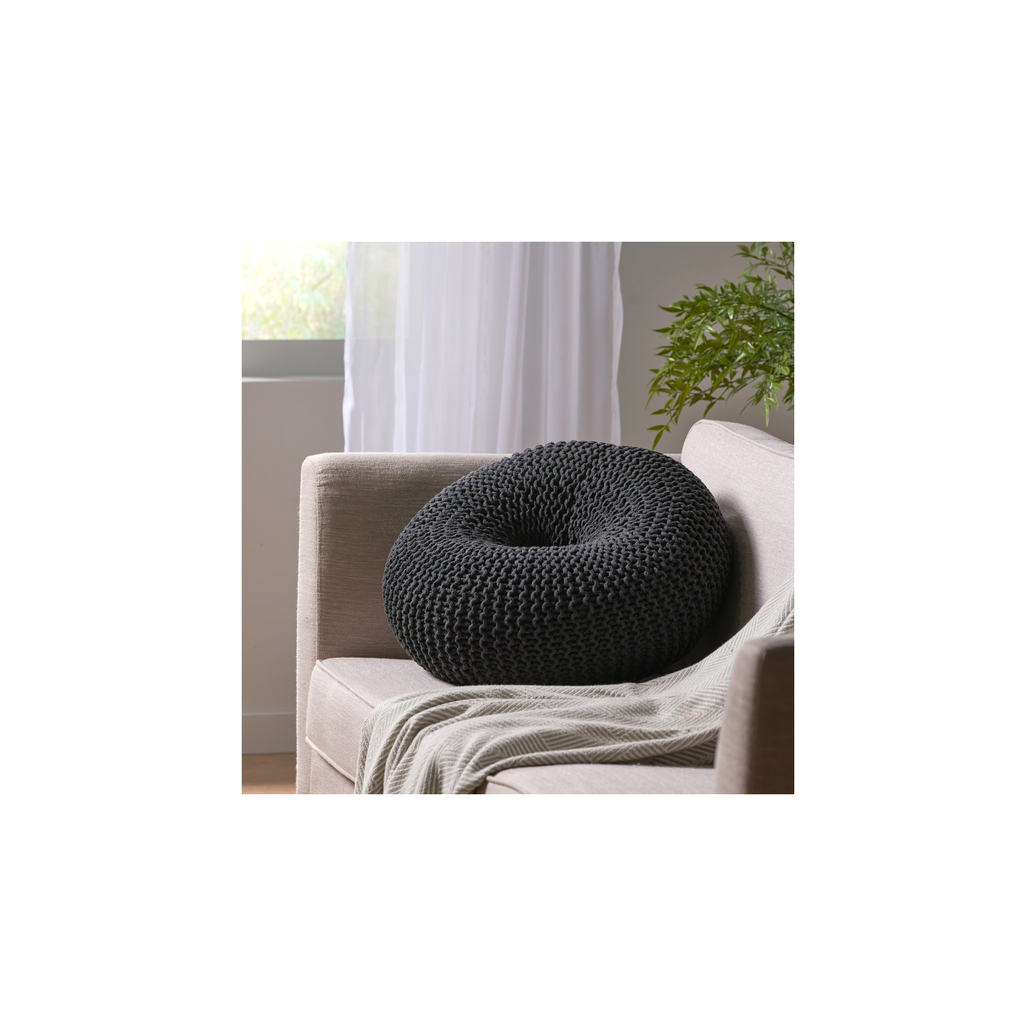 Pouf en coton à motif de beigne gris