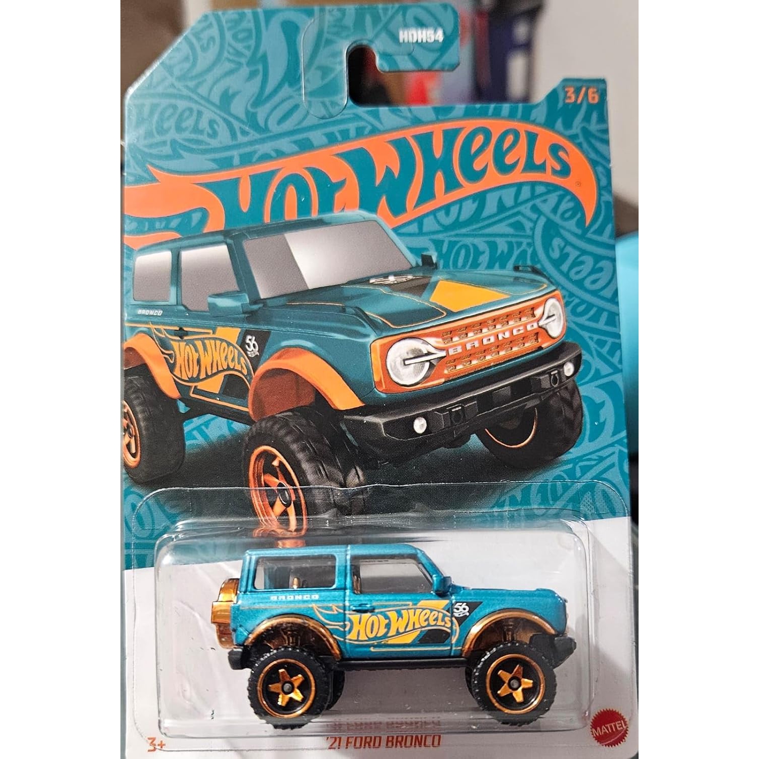 Voiture ou camion jouet en métal moulé à échelle 1:64 de Hot Wheels avec décorations turquoise et cuivre 21 Ford Bronco
