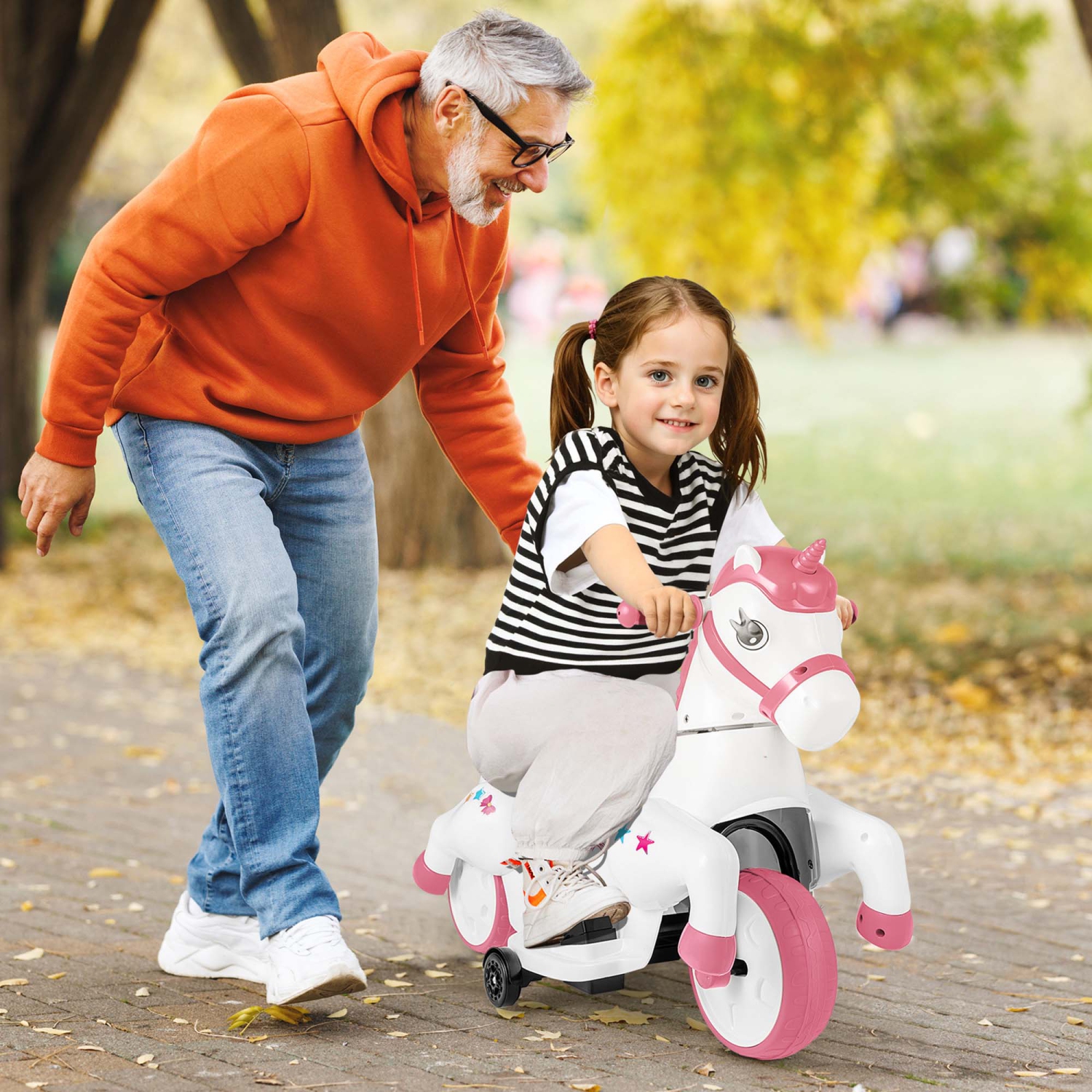 Costway 12V Kids Ride on Unicorn Toy with Training Wheels Music One-button Start Horse Toy Red/Blue/Pink
