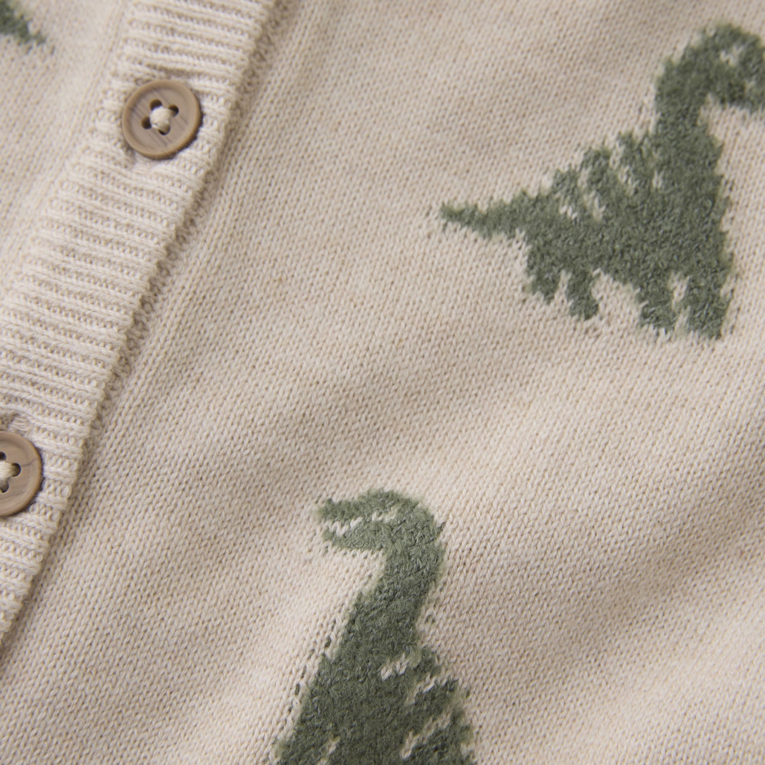 Cardigan en tricot de coton biologique de Minymo - Dinos sur mélange beige pâle