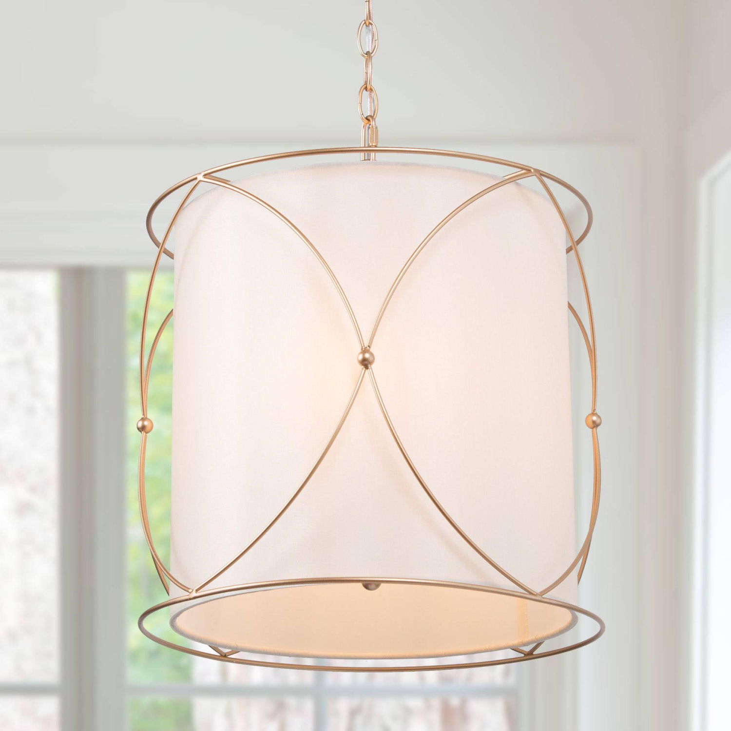 3-light gold drum chandelier with white fabric shade