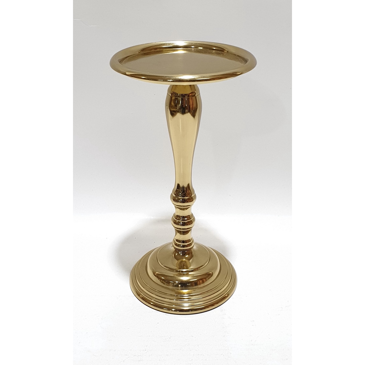 Ant.gold pillar candle h. 9" h.