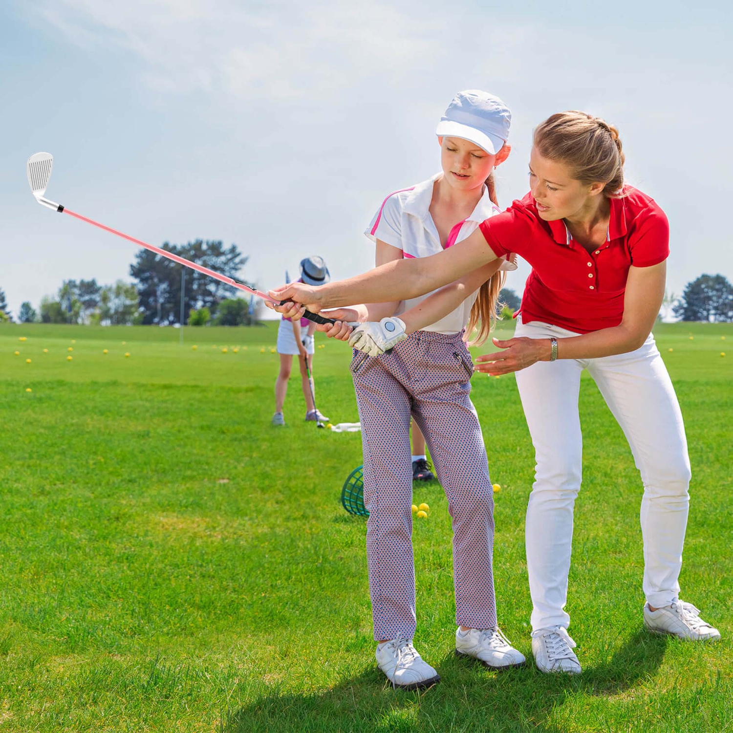 Fer à repasser no 7 Junior de 33&nbsp;po d'Ultimate avec tige en fibre de verre et couvre-tête Gold Club bleu/rose