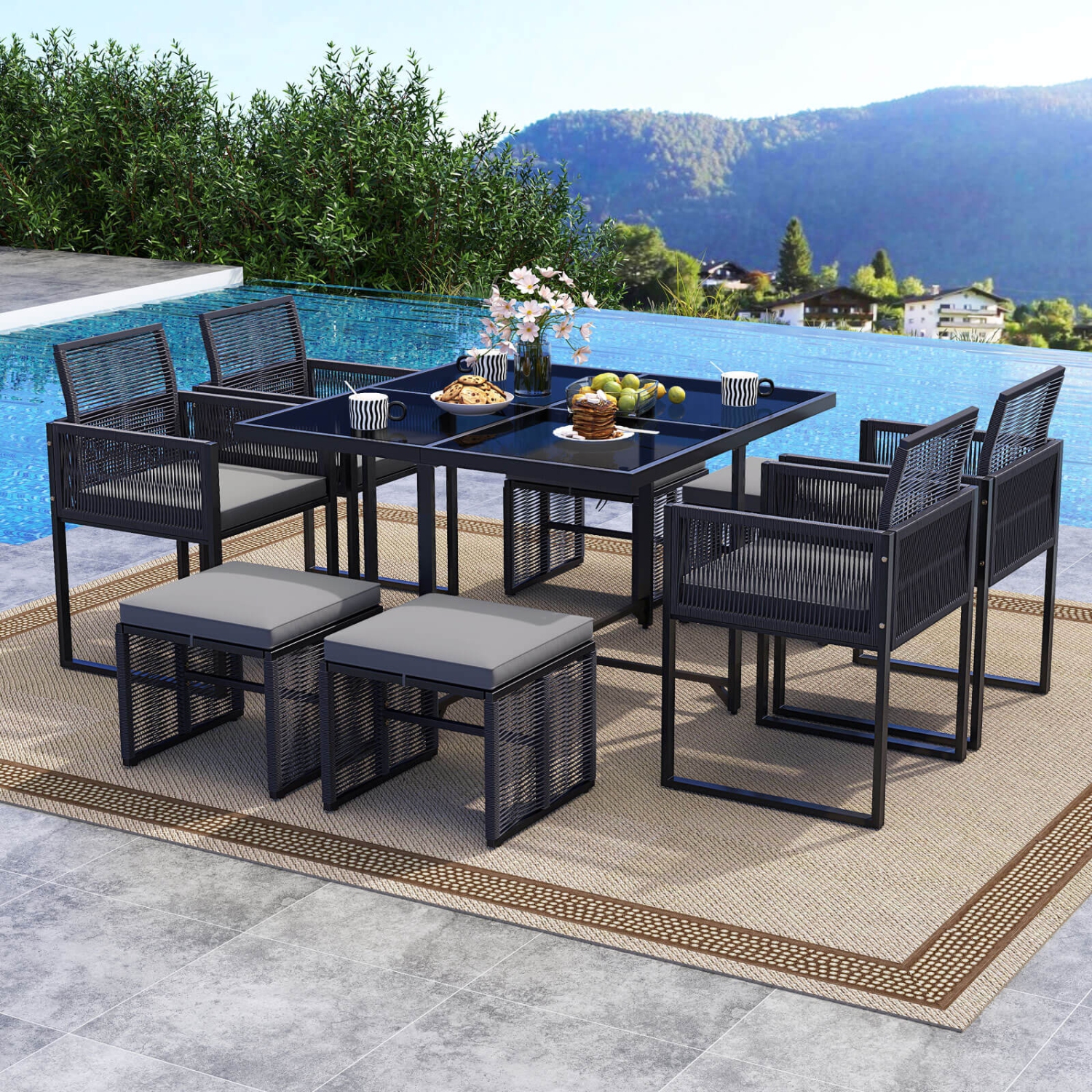 Ensemble de salle à manger de patio 9 PCS de Costway avec chaises en rotin de PE Table en verre trempé et poufs